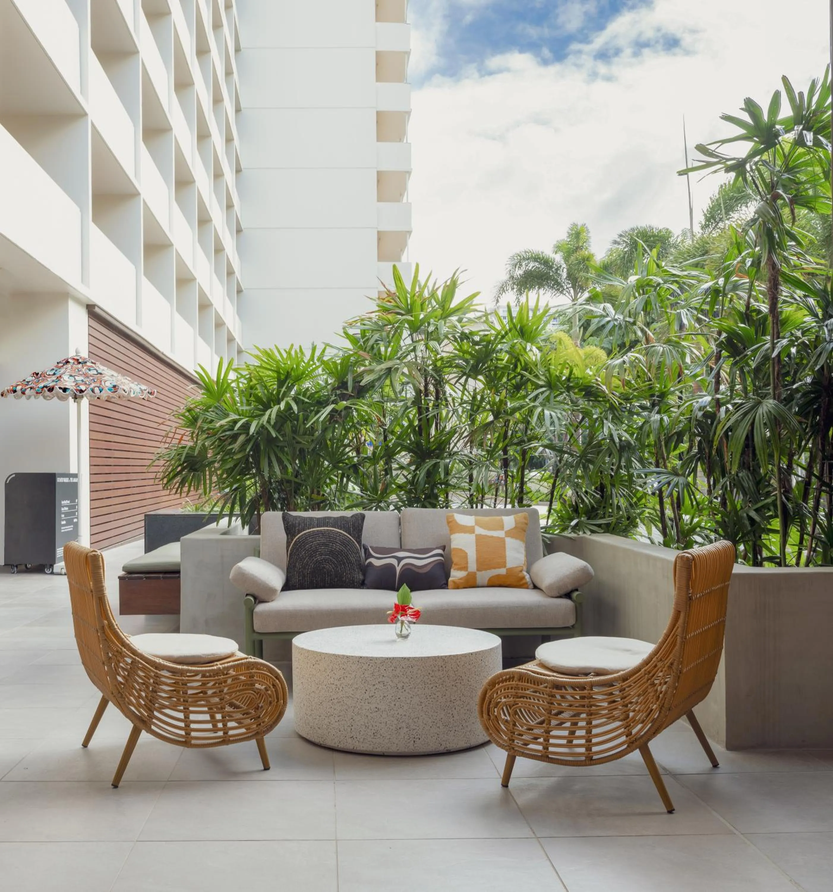 Seating area in The Ambassador of Waikiki, Tapestry Collection by Hilton