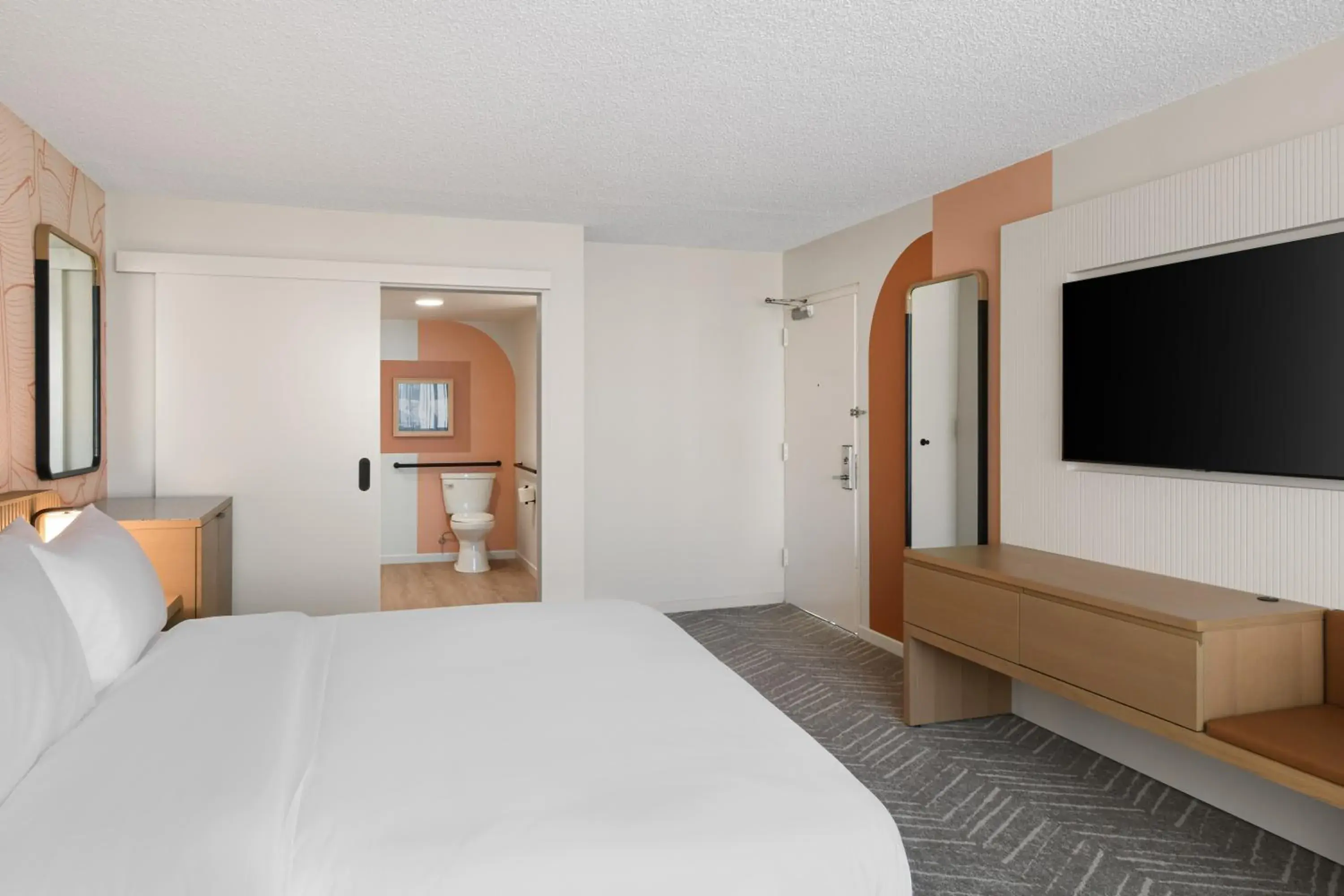 Accessible Partial Ocean View with King Bed and Tub in Romer Waikiki at The Ambassador Accessible Partial Ocean View with King Bed and Tub in Romer Waikiki at The Ambassador