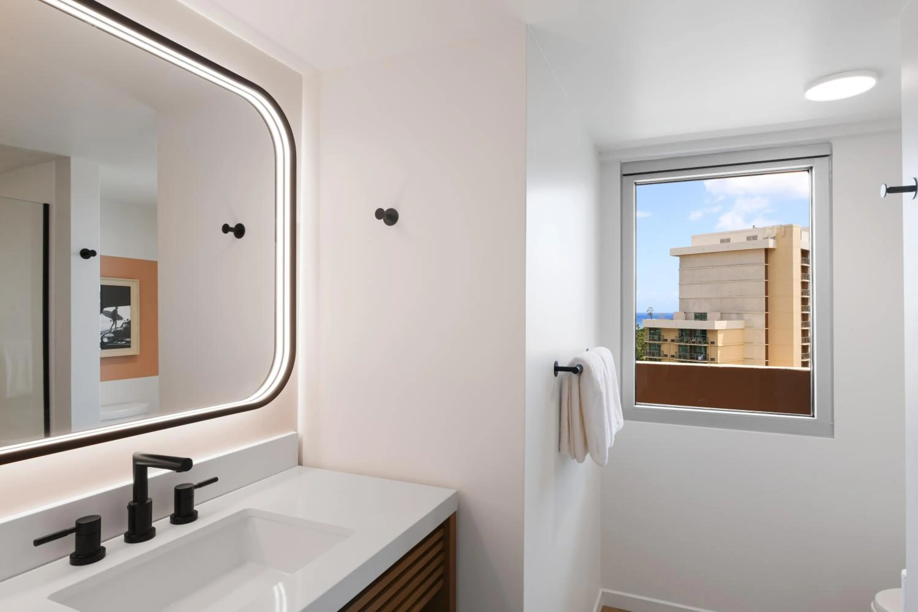 Bathroom in The Ambassador of Waikiki, Tapestry Collection by Hilton