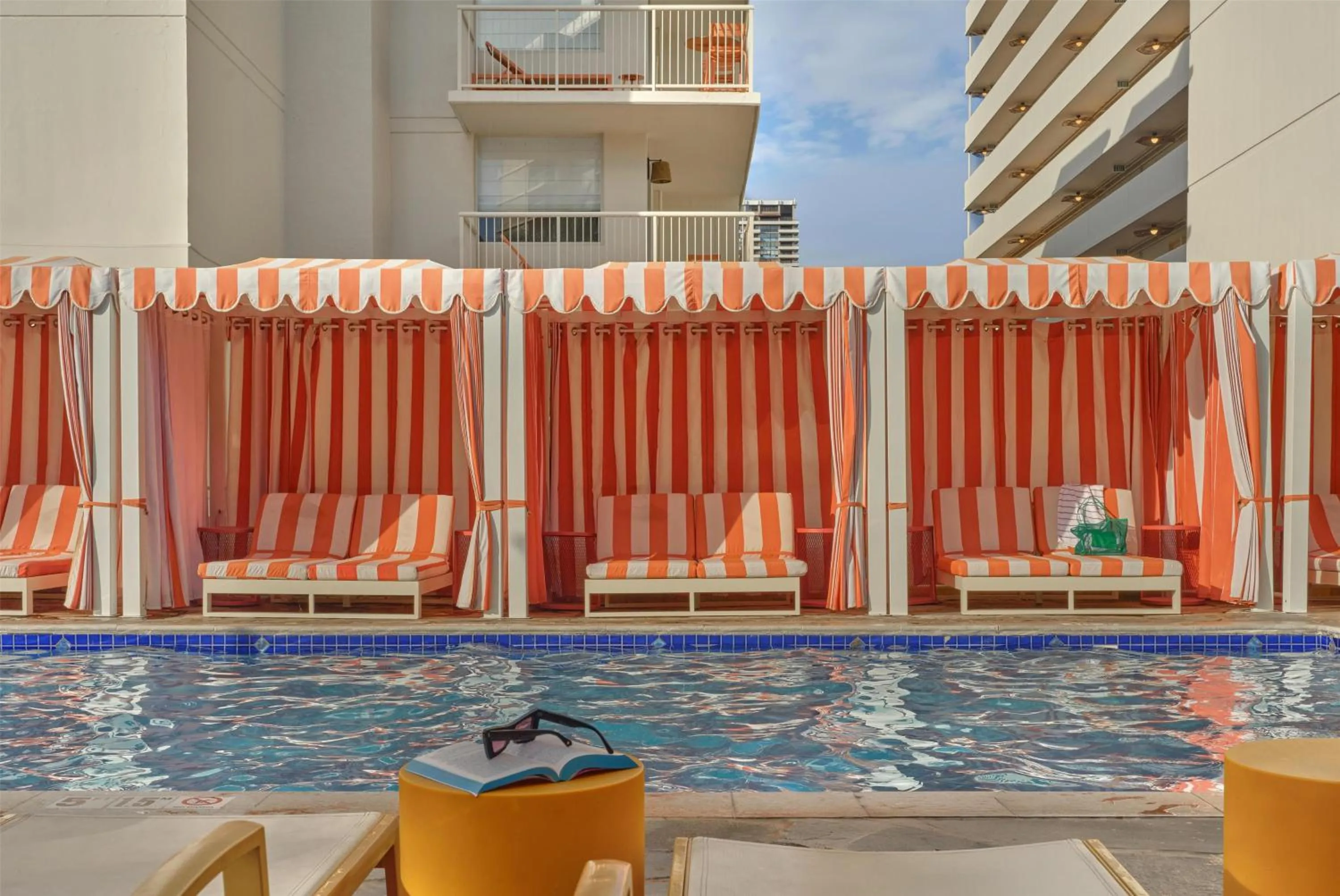 Swimming pool in The Ambassador of Waikiki, Tapestry Collection by Hilton