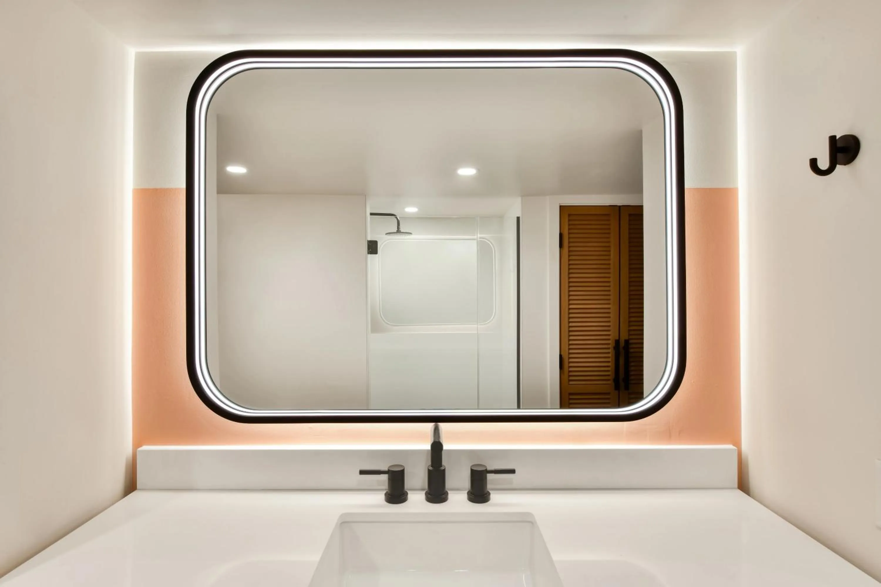 Bathroom in The Ambassador of Waikiki, Tapestry Collection by Hilton