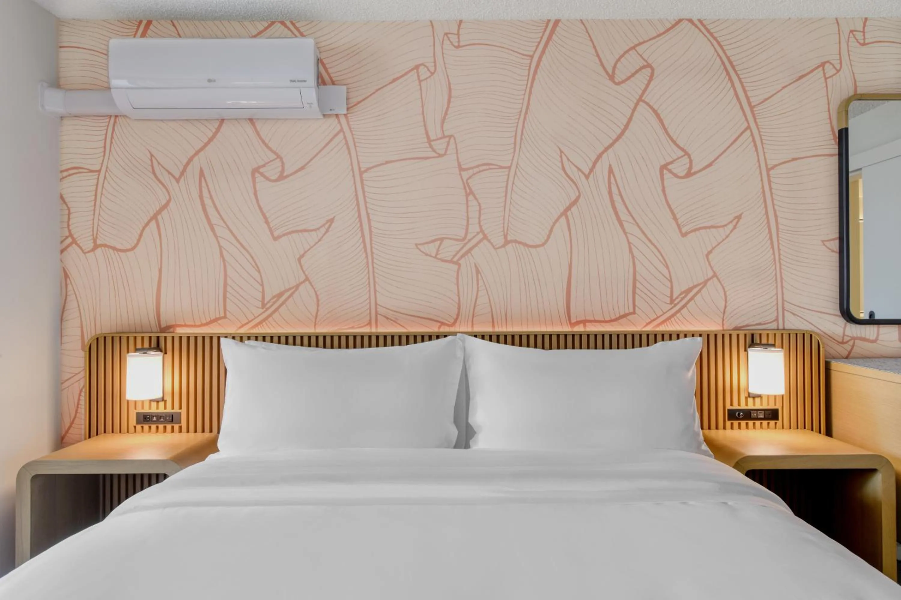 Bed in The Ambassador of Waikiki, Tapestry Collection by Hilton