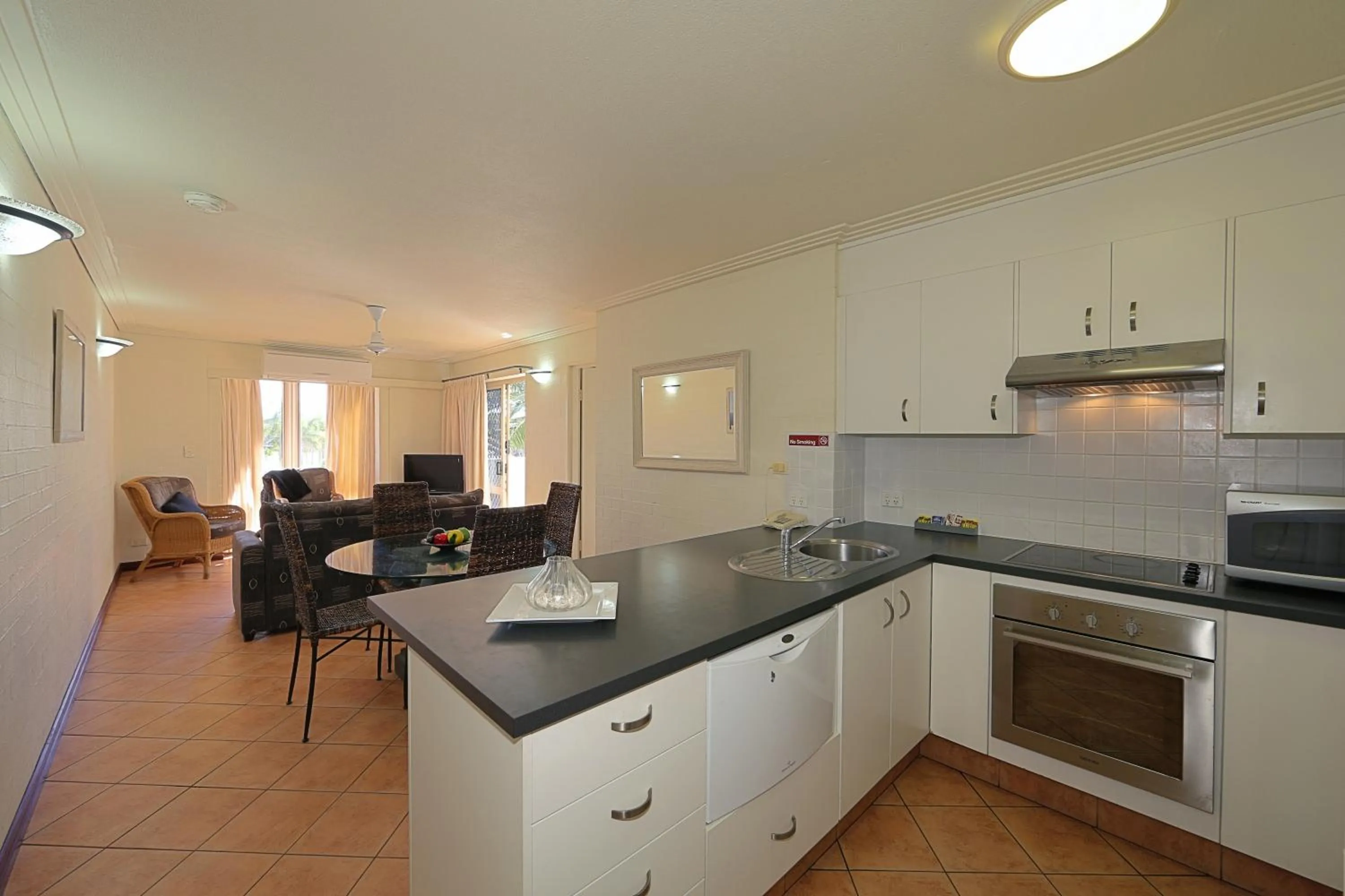 Kitchen or kitchenette in Bargara Shoreline Apartments