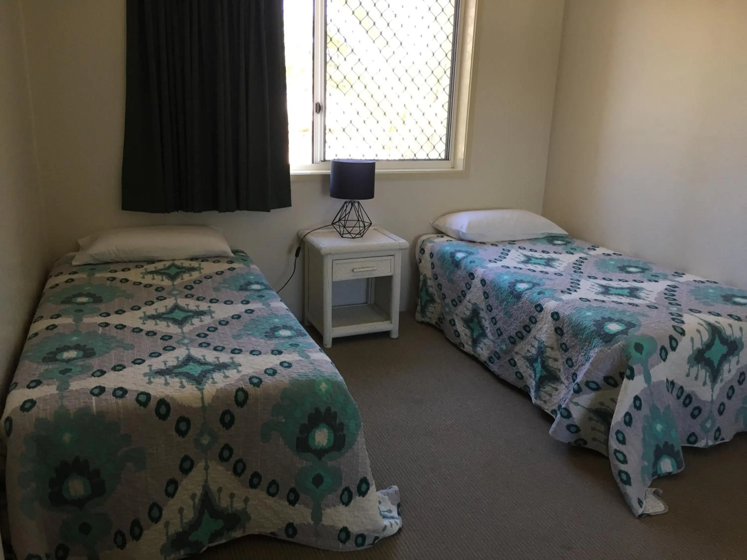 Bed in Sea Mist Palms