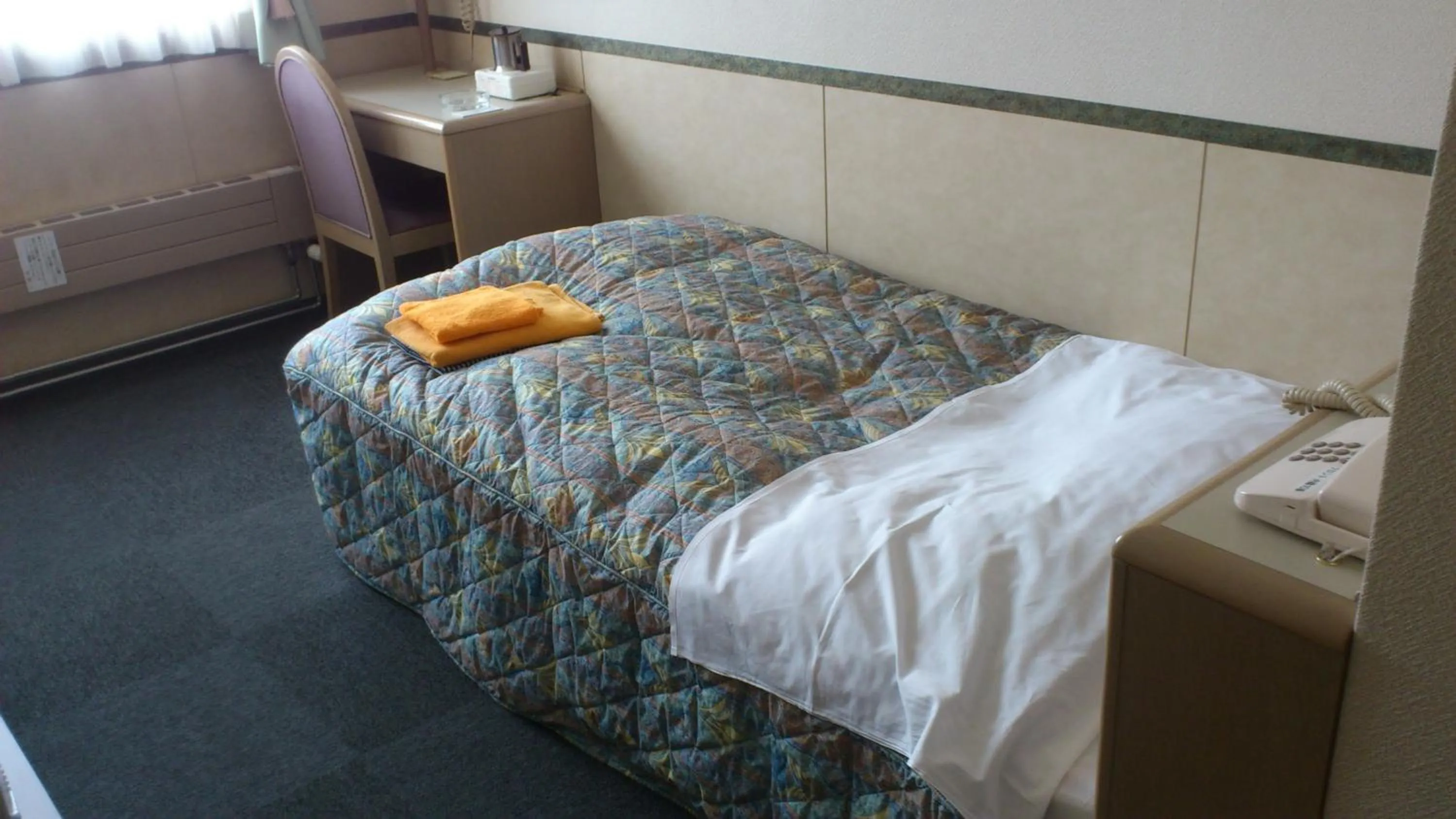 Photo of the whole room, Bed in Business Hotel Motonakano