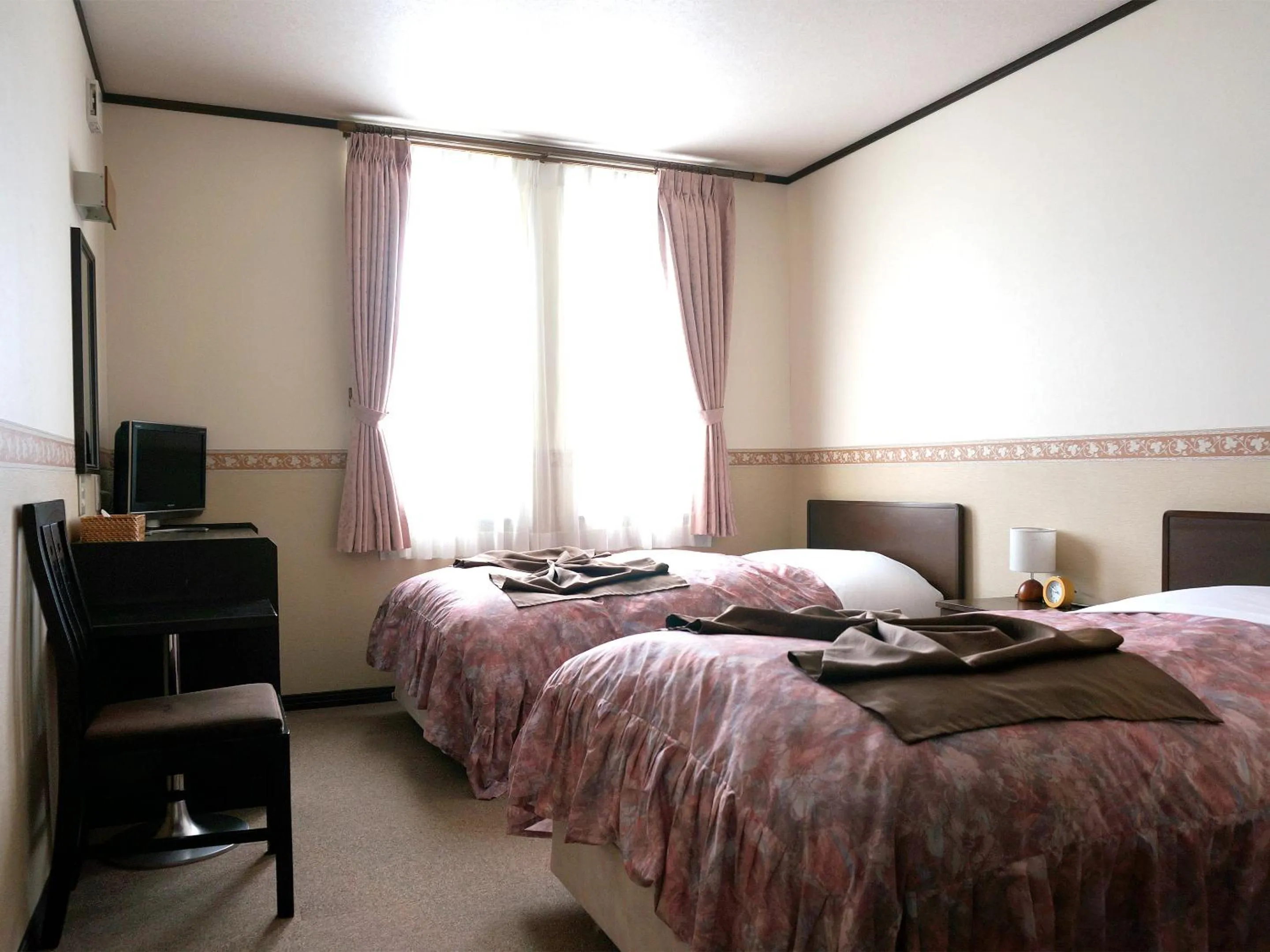 Living room, Bed in Petit Hotel Blaneneige