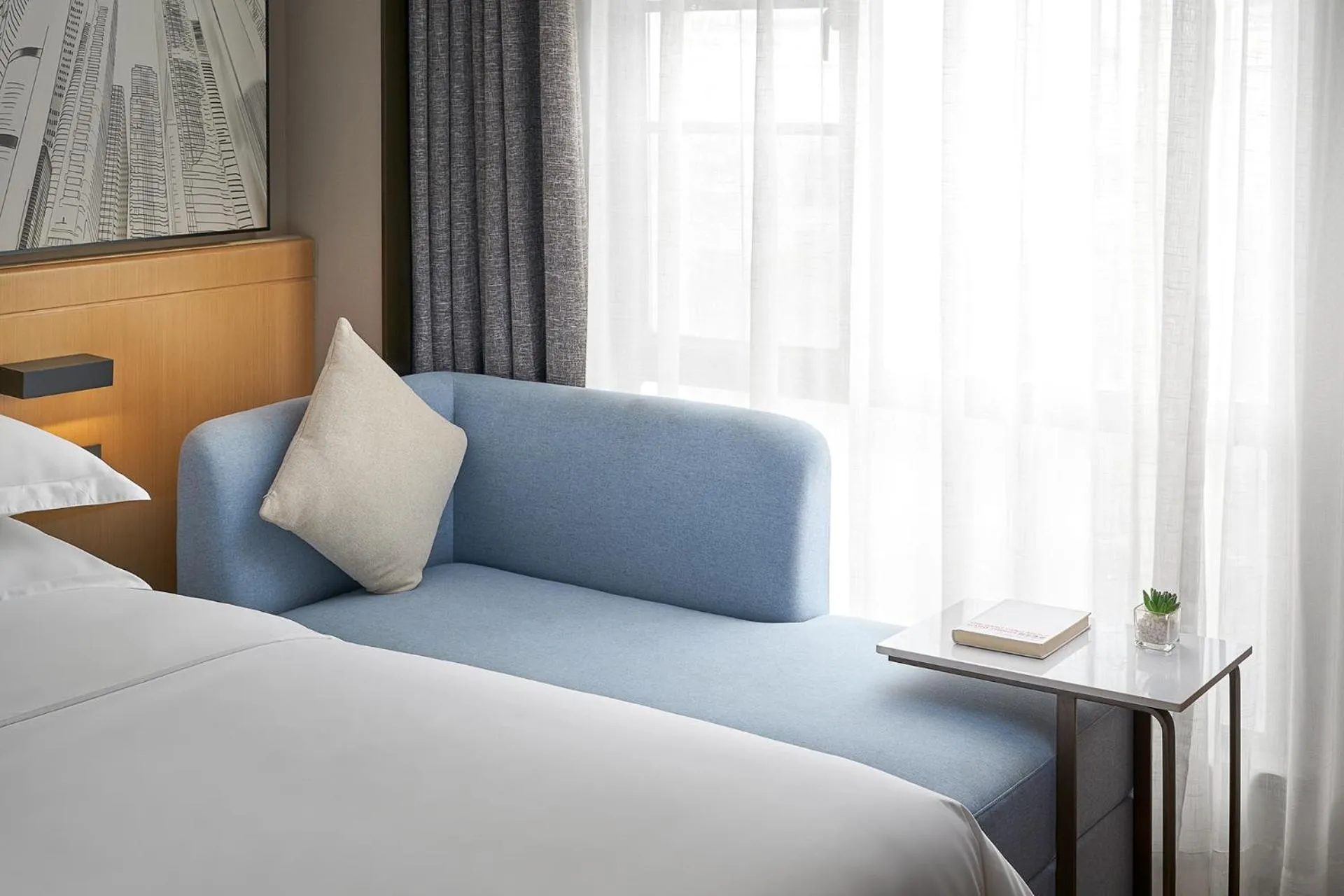 Seating area, Bed in Fengyue Light Shang Hotel Guangzhou Baiyun Airport Store