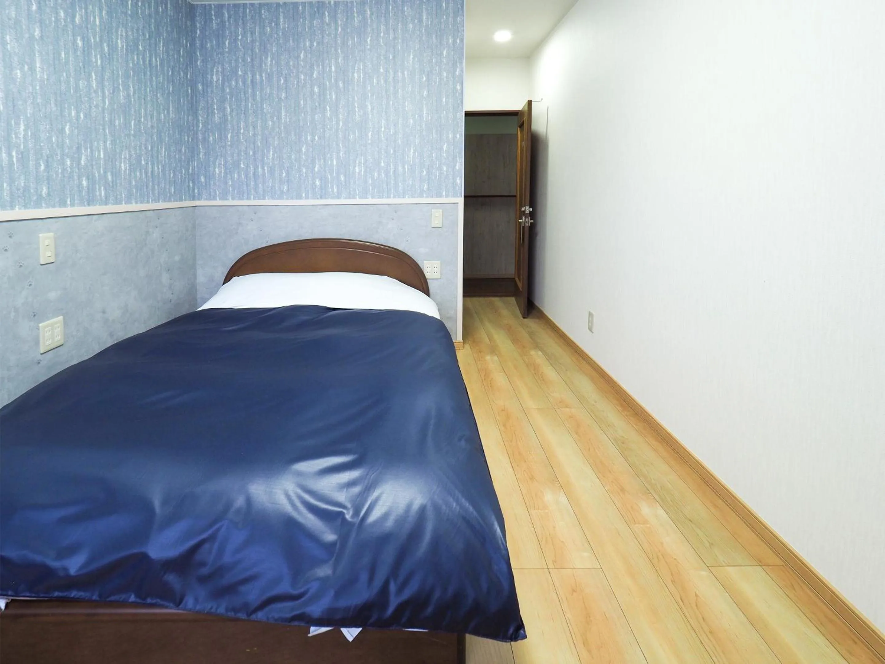 Bedroom, Bed in Petit Hotel Gracey Tomamu