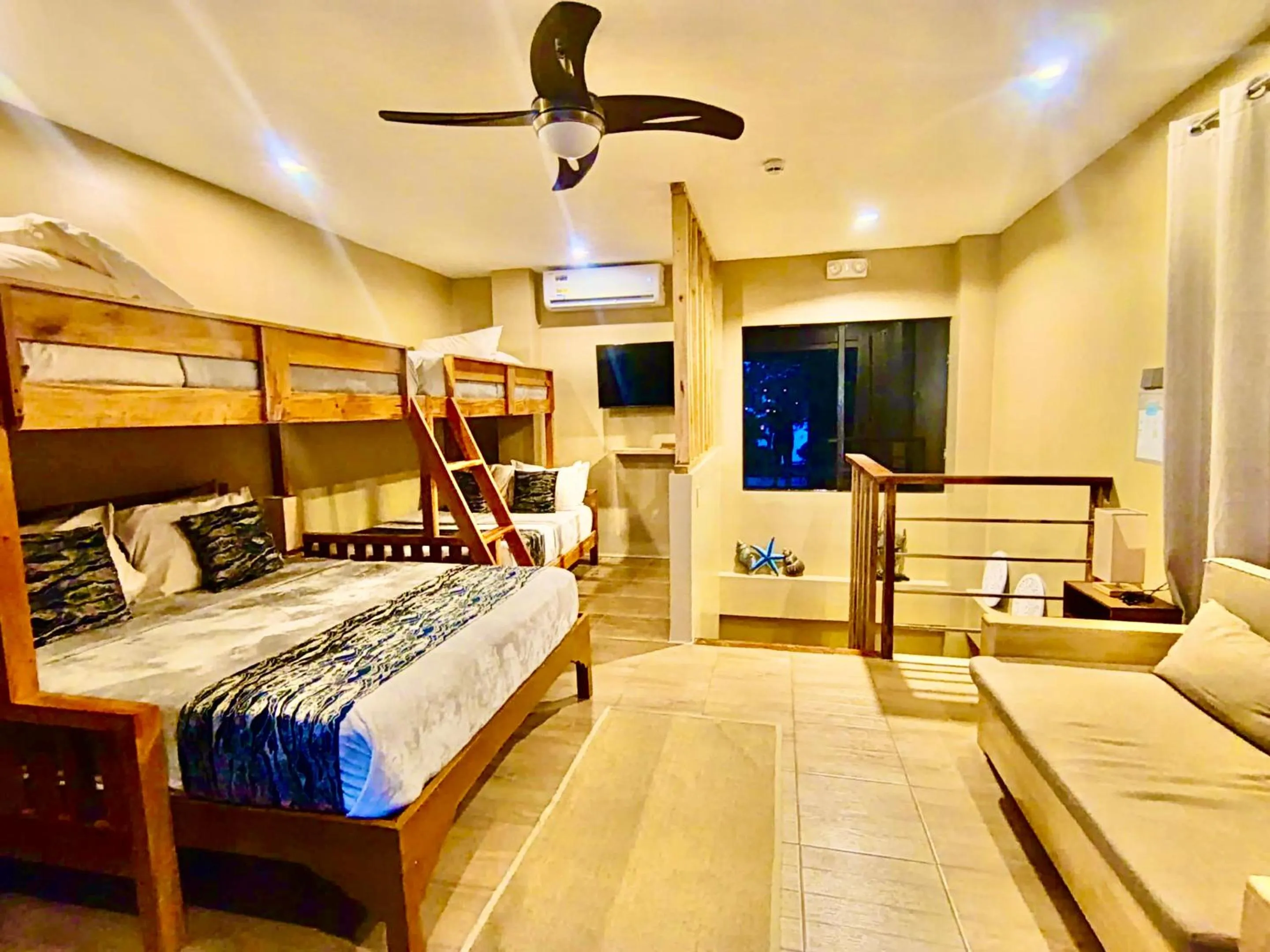Bed in Southseas Beach Resort and Dive Center