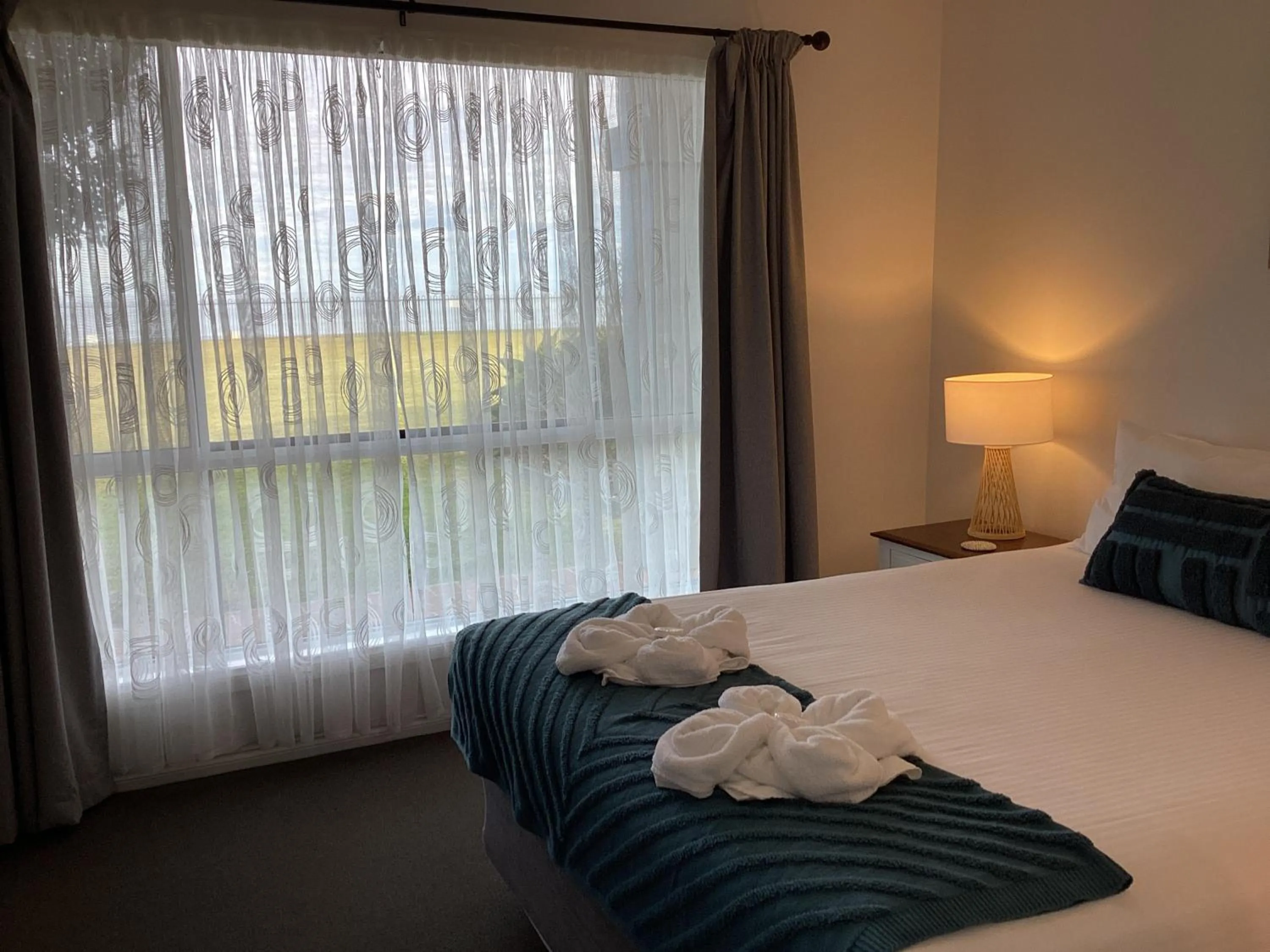 Bed in Meridian Beachside Apartments