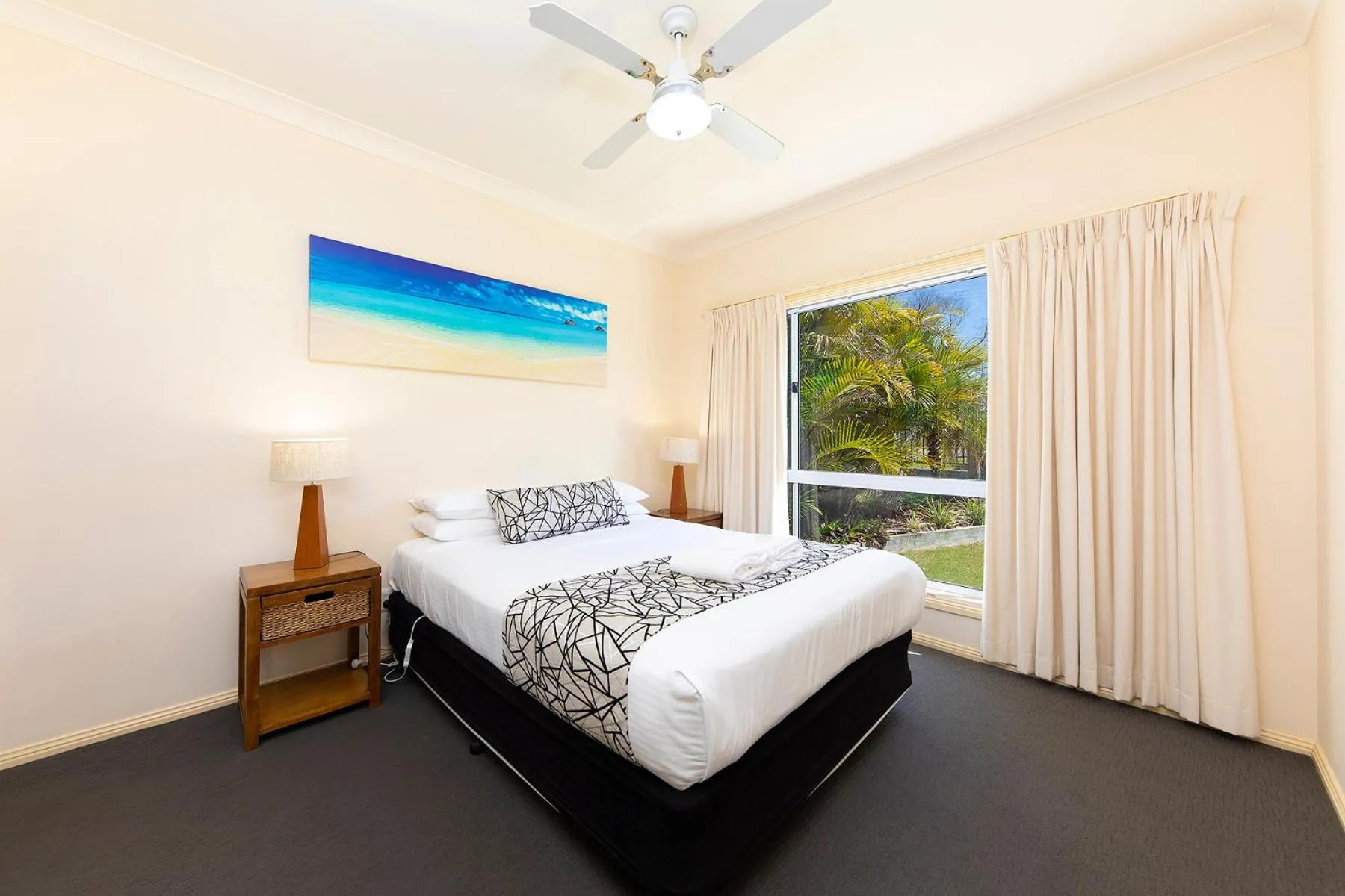 Bed in Meridian Beachside Apartments