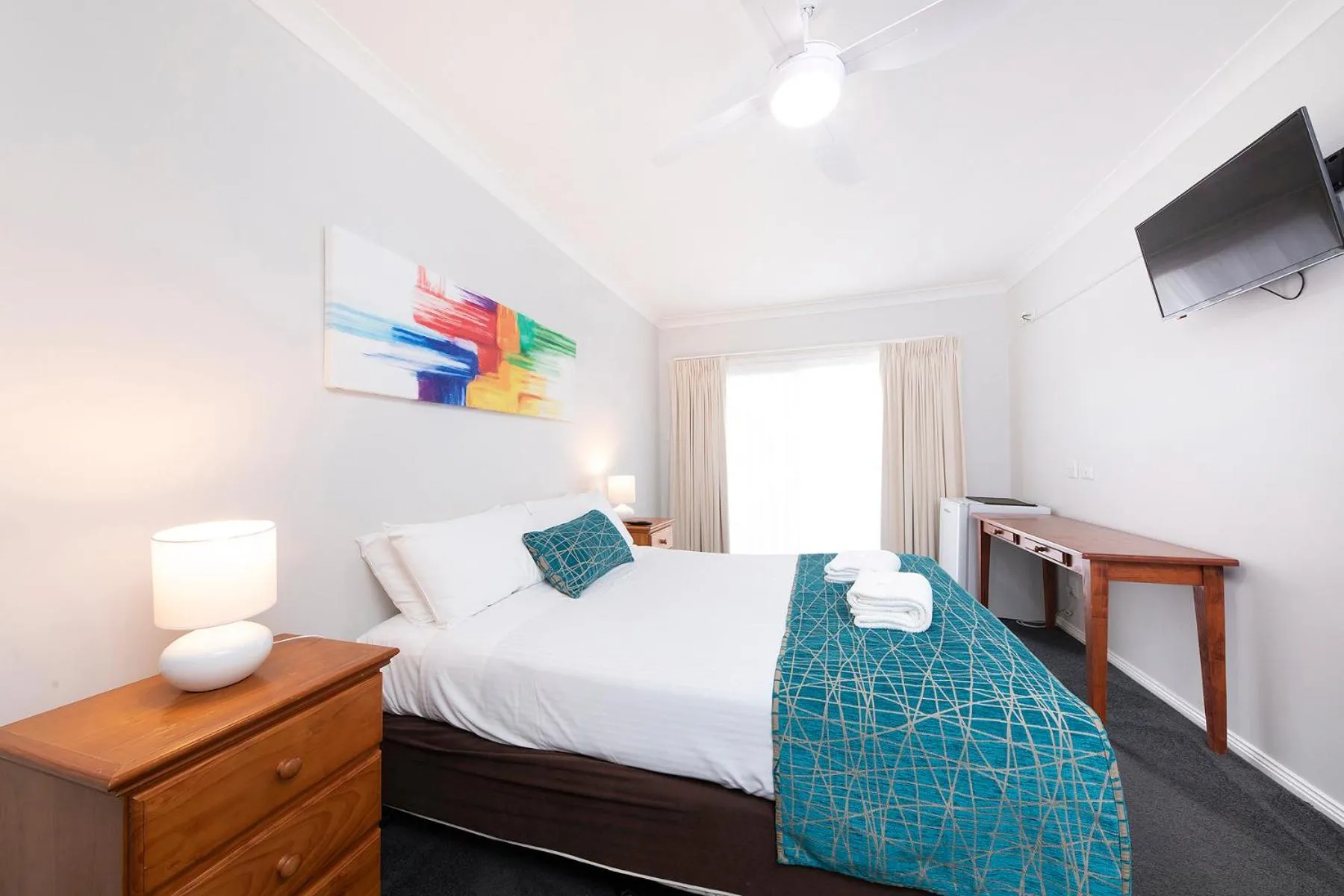 Bed in Meridian Beachside Apartments