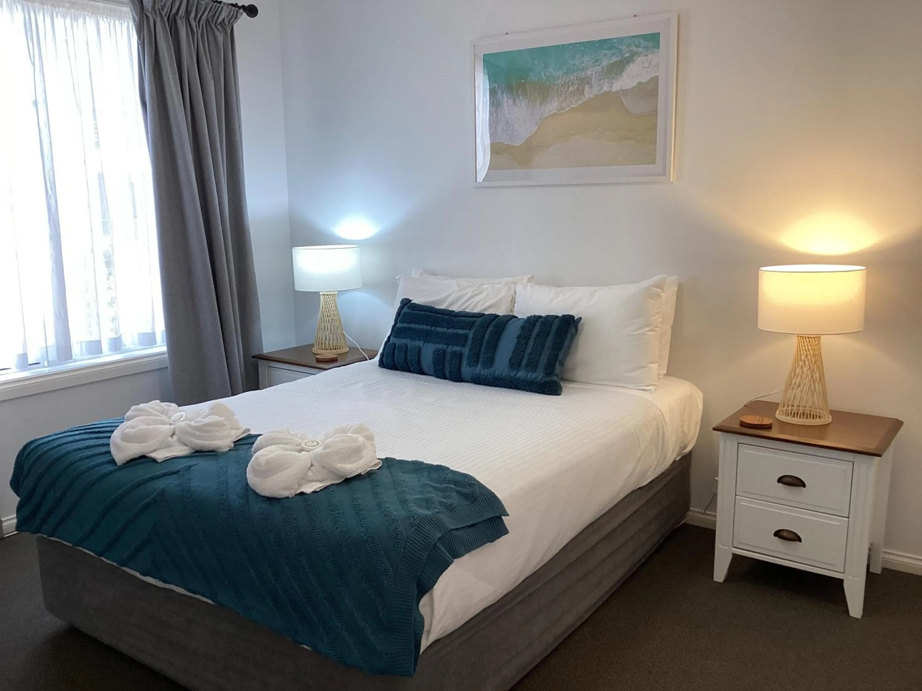 Bed in Meridian Beachside Apartments