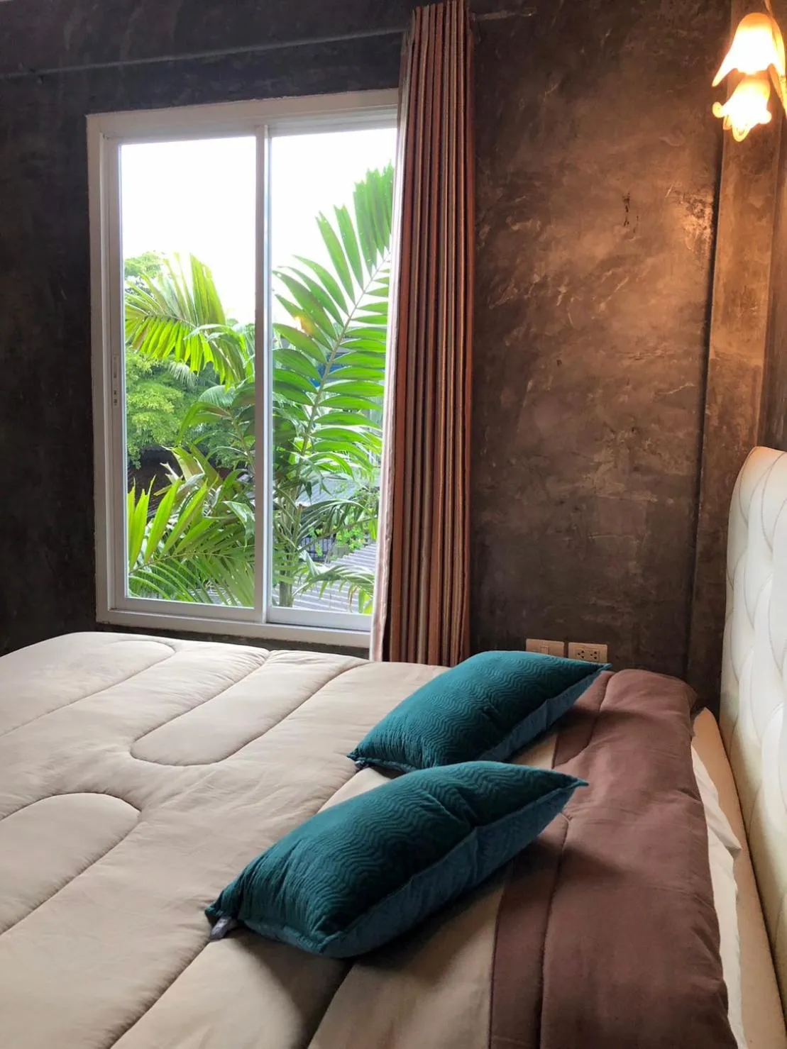 Bed in Bansuanrimnam Pakchong Resort