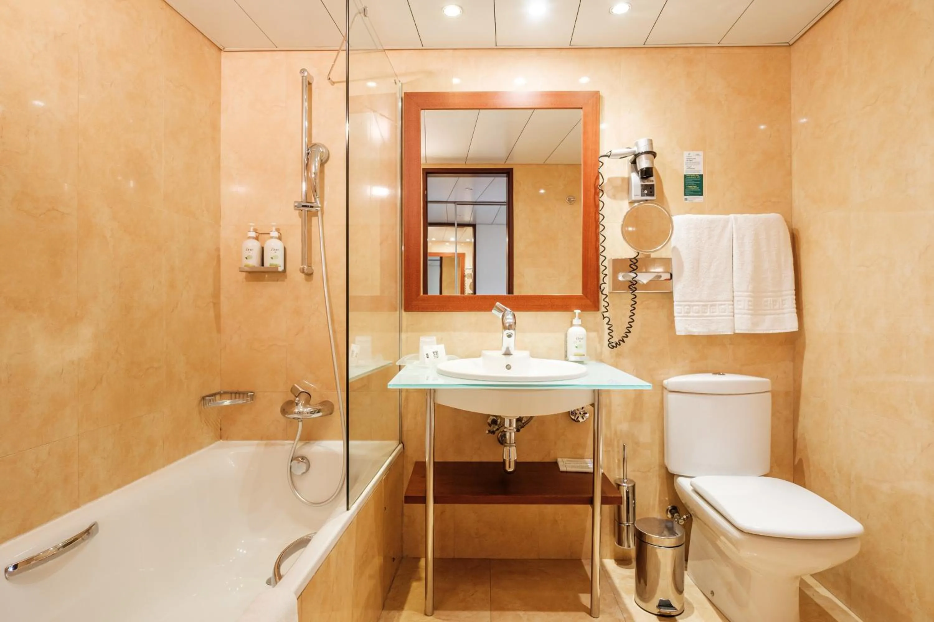 Toilet in Holiday Inn Lisbon-Continental by IHG