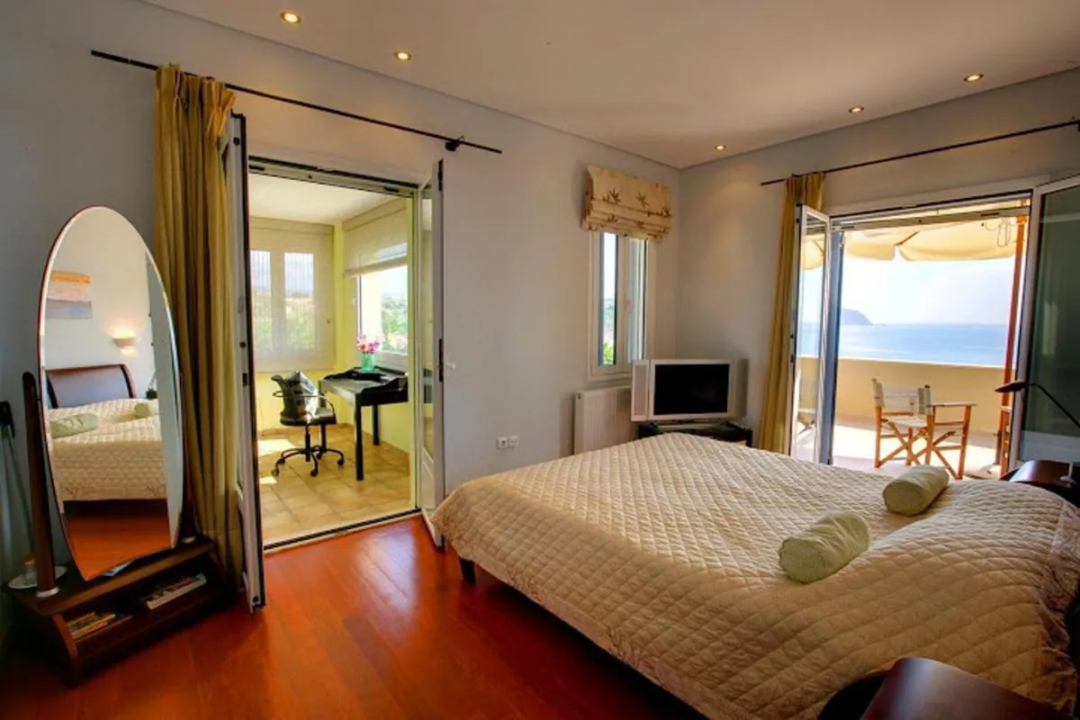 Bed in Monambeles Villas