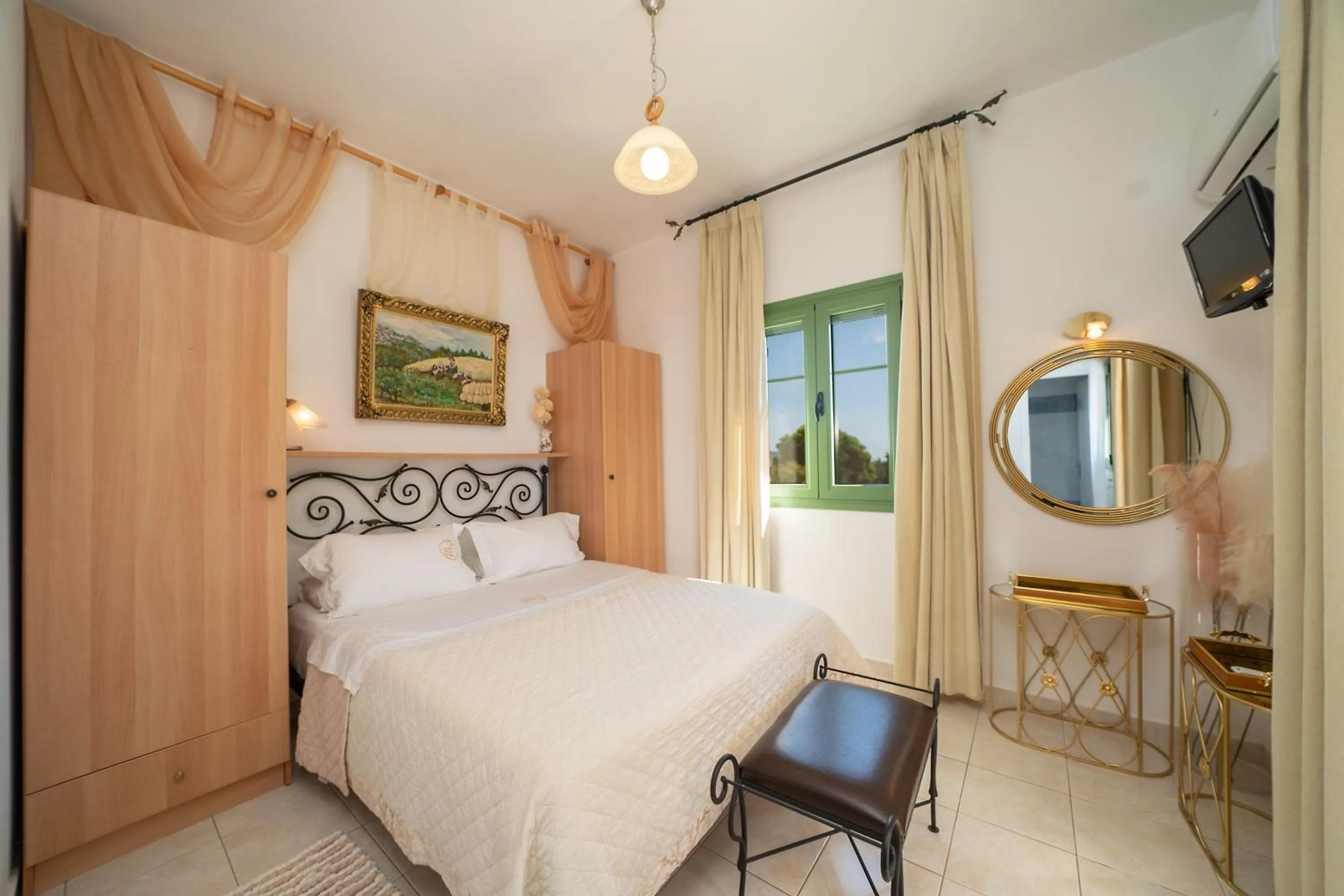 Bed in Monambeles Villas