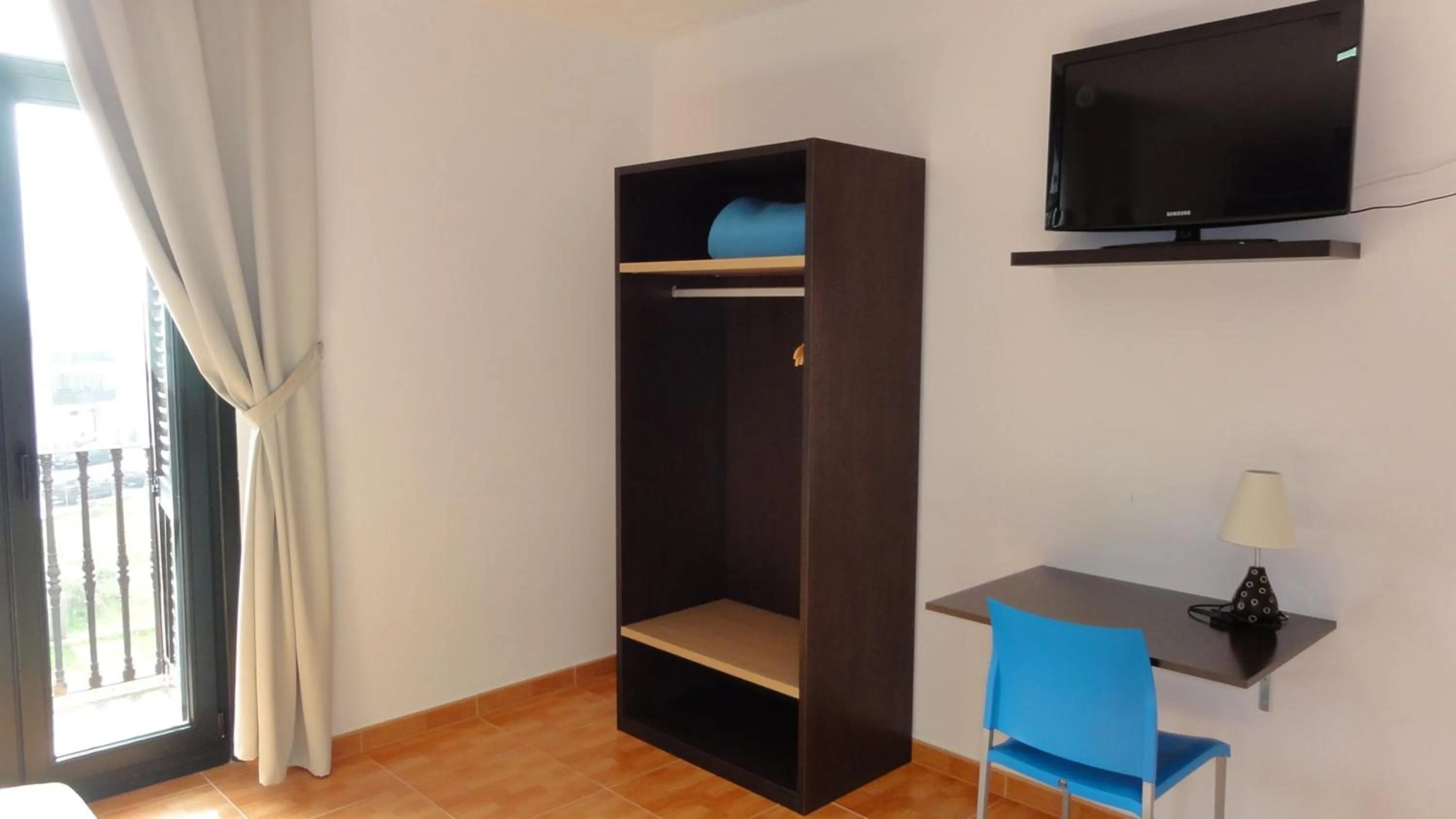 Seating area in Aparthotel Can Gallart