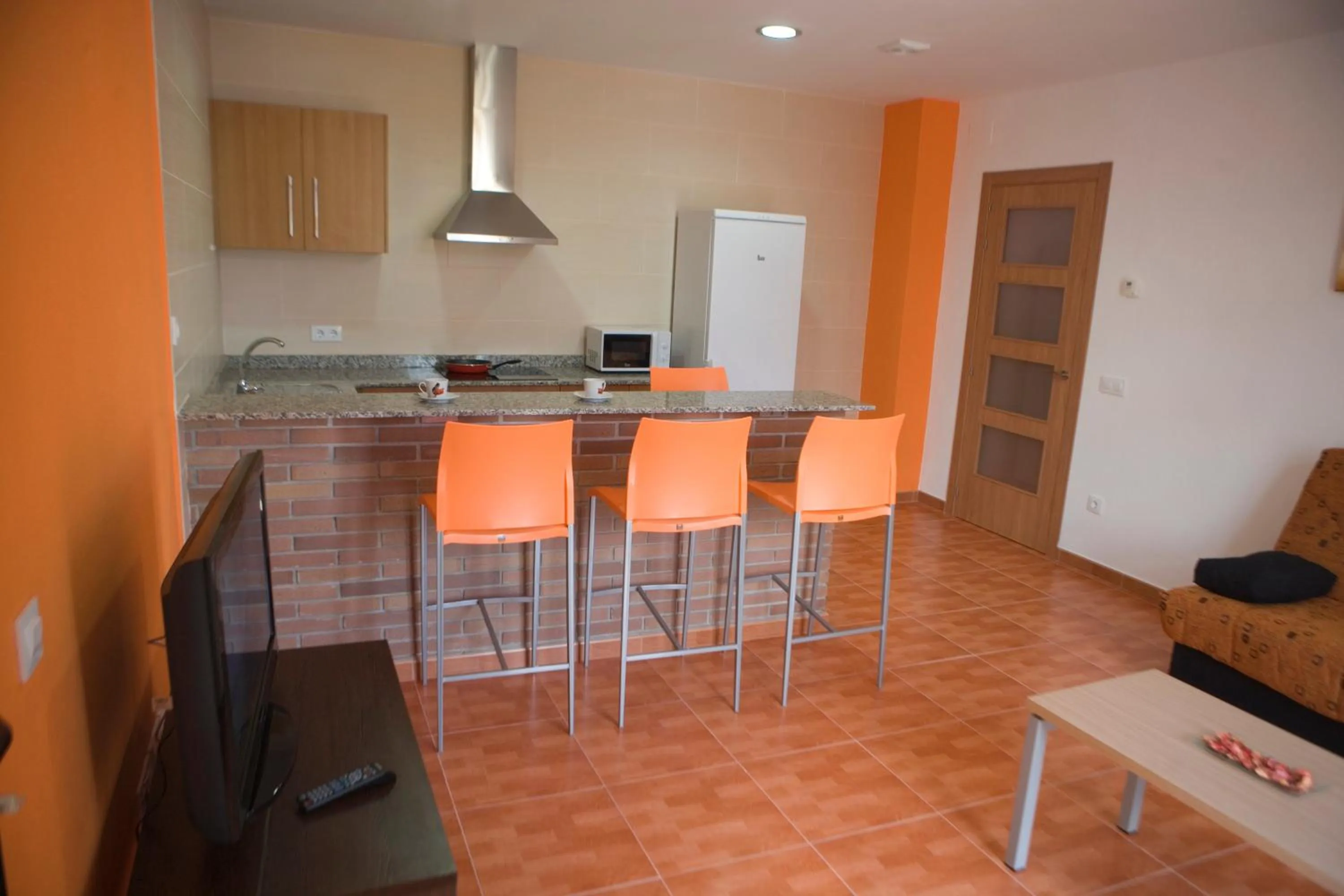 Kitchen or kitchenette in Aparthotel Can Gallart