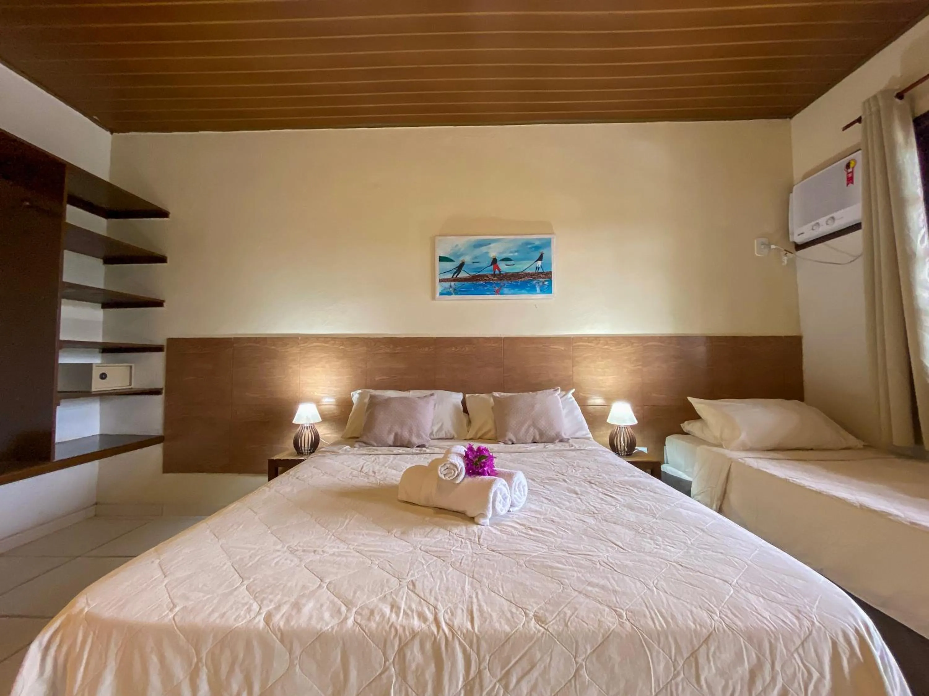 Bed in Pousada New Paradise