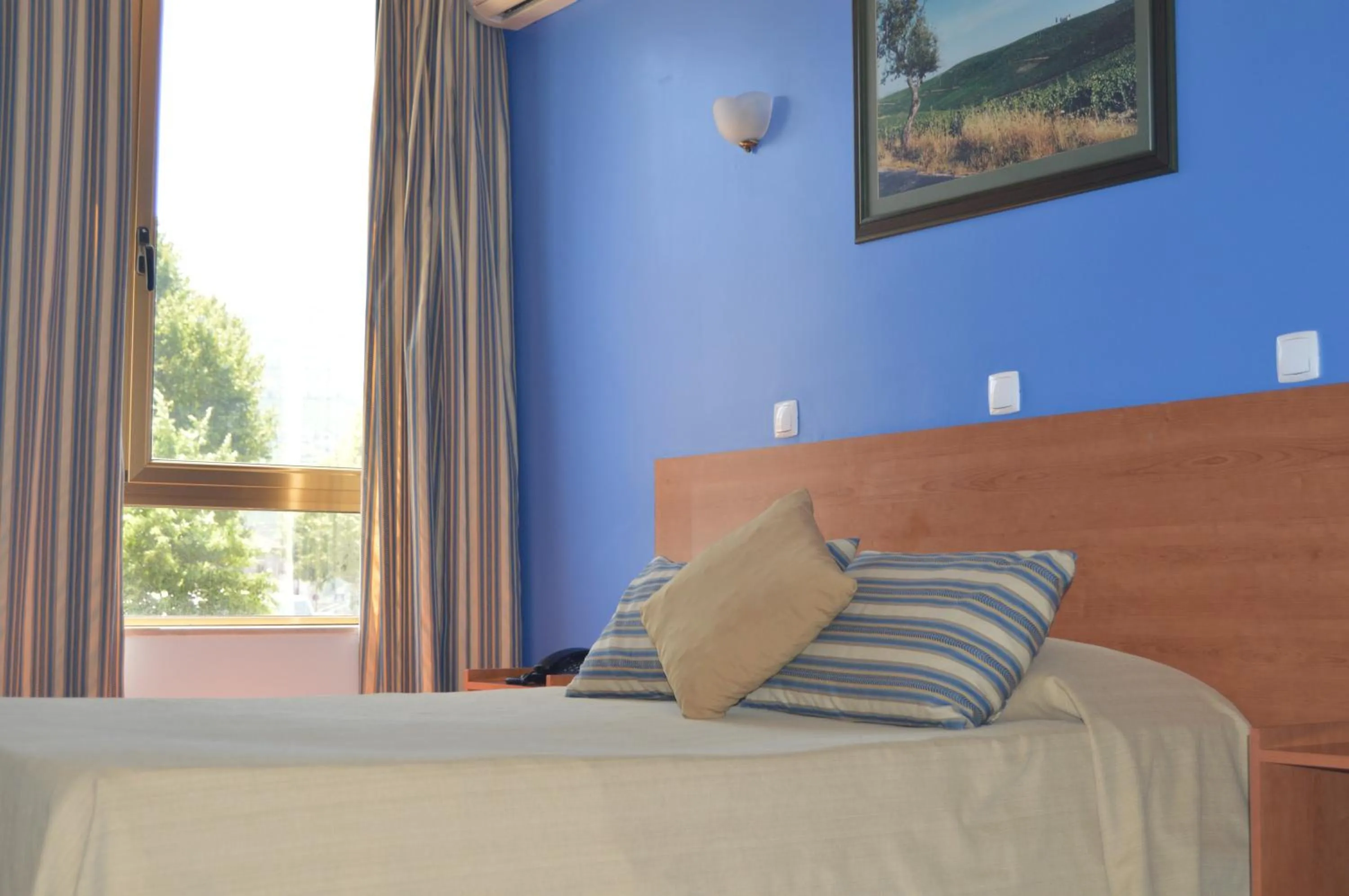 Bedroom, Bed in Imperio Hotel