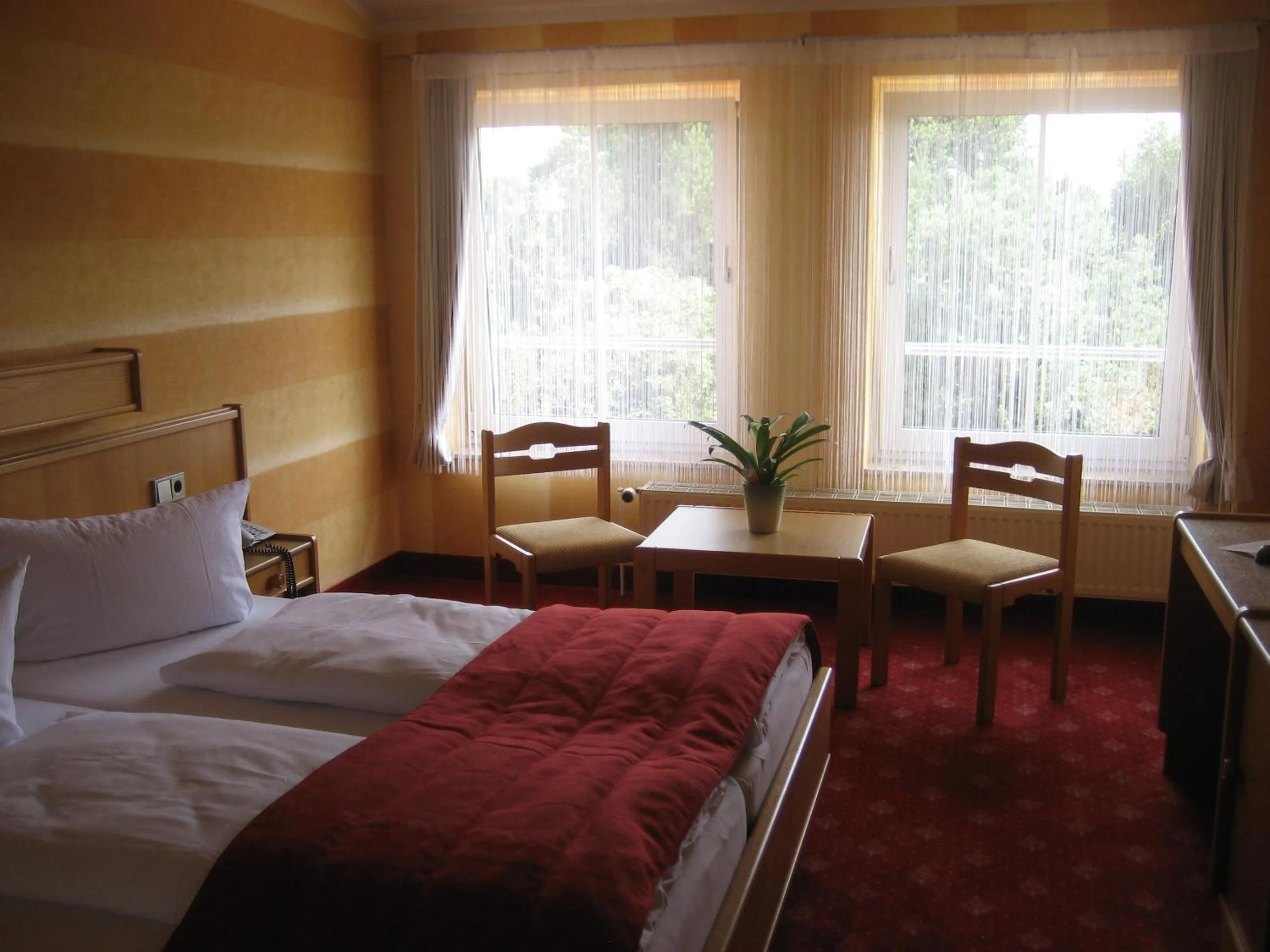Photo of the whole room, Bed in Hotel Eleganz