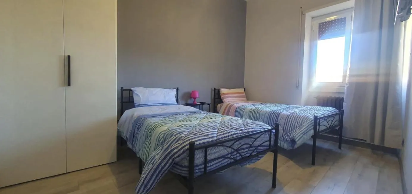 Bed in Hello Roma B&B