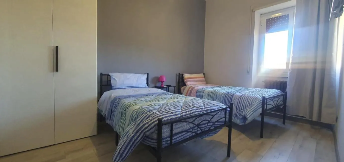 Bed in Hello Roma B&B