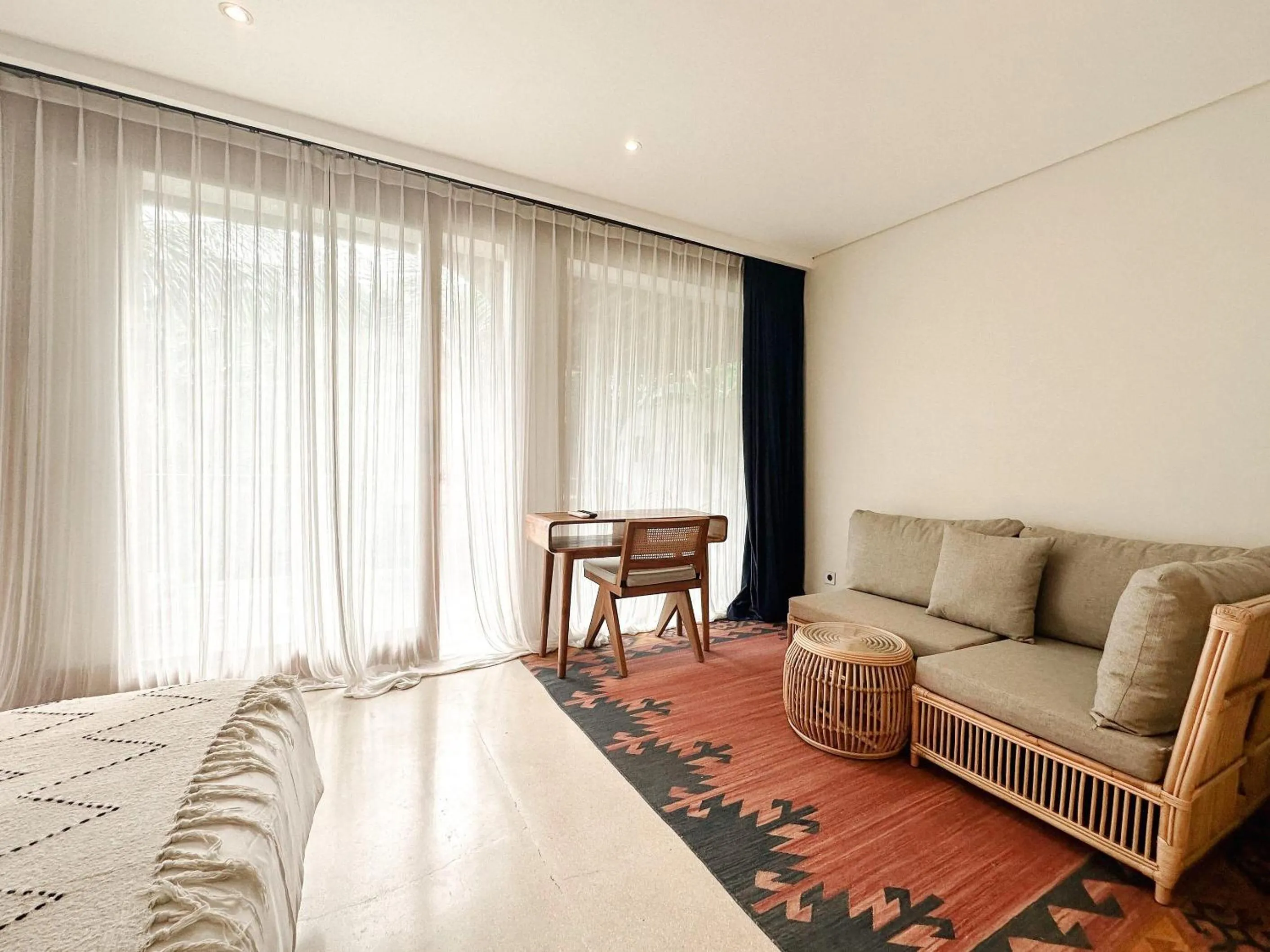 Seating area, Bed in ZIN Canggu Resort & Villas