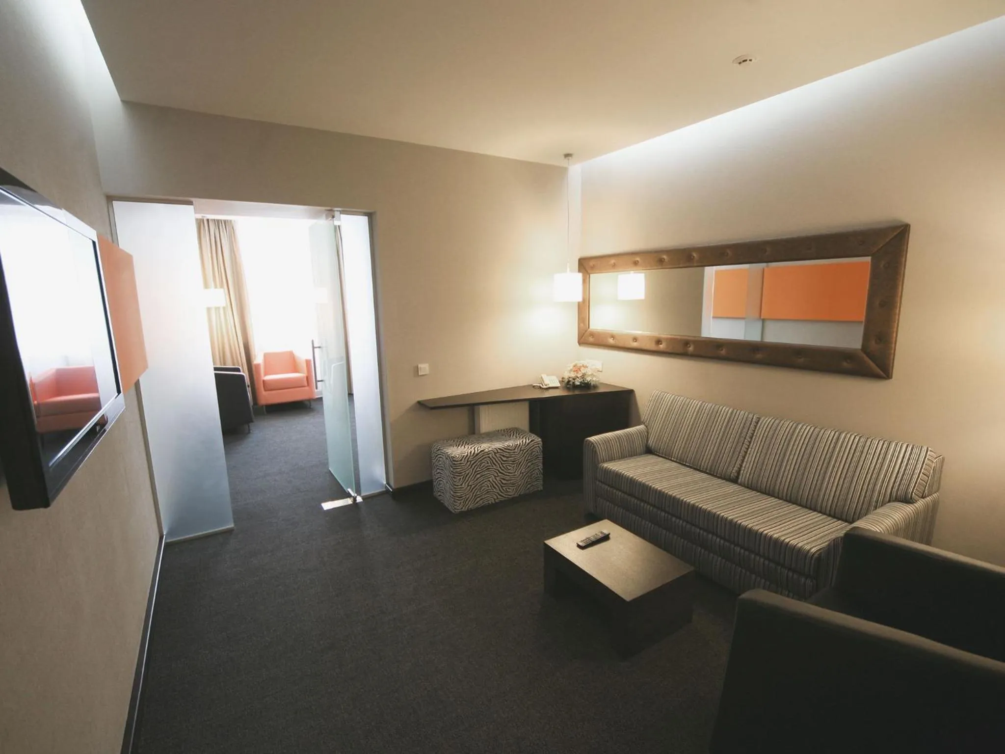 Living room in City Park Hotel by CHM