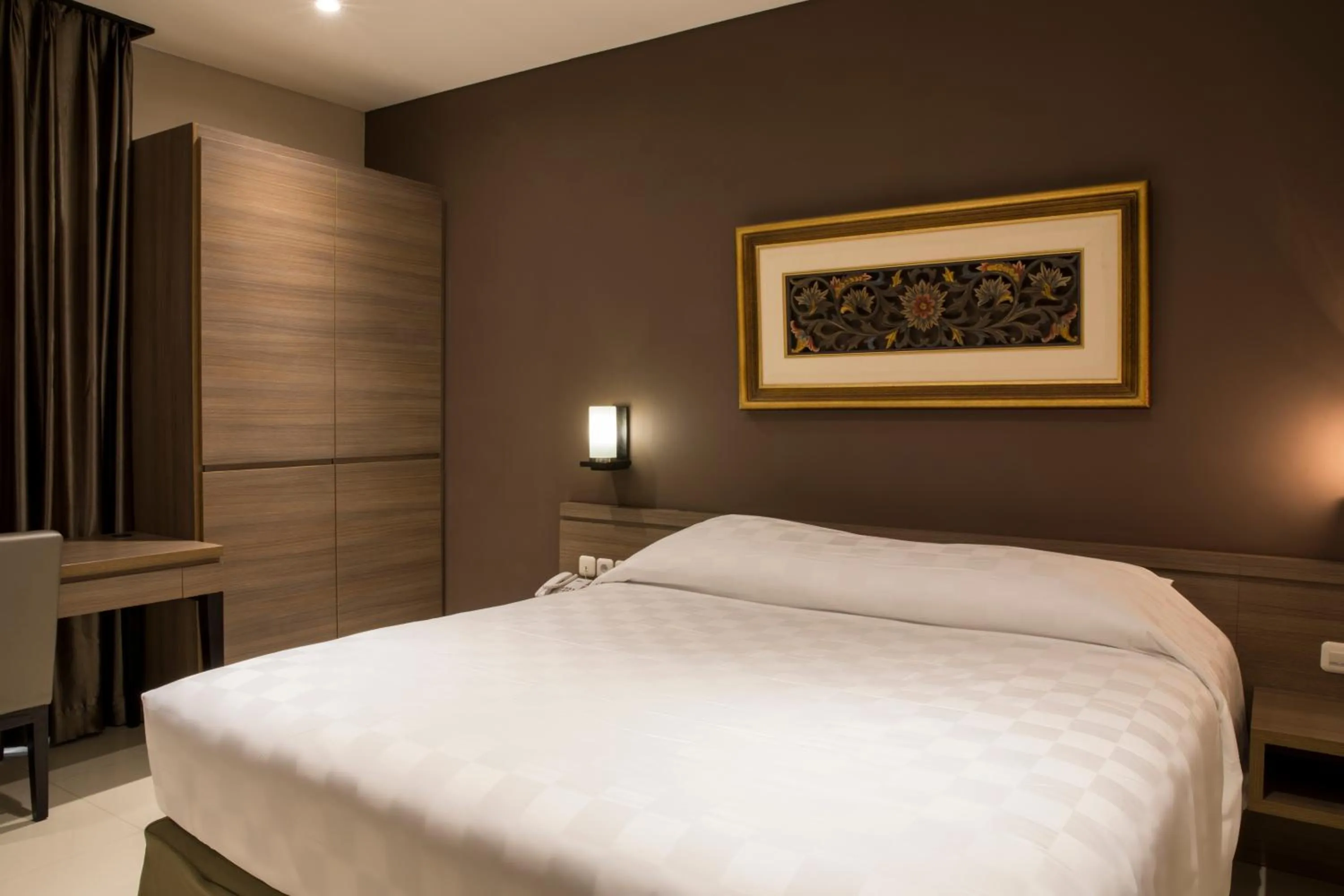 Bed in Mambruk Hotel & Convention