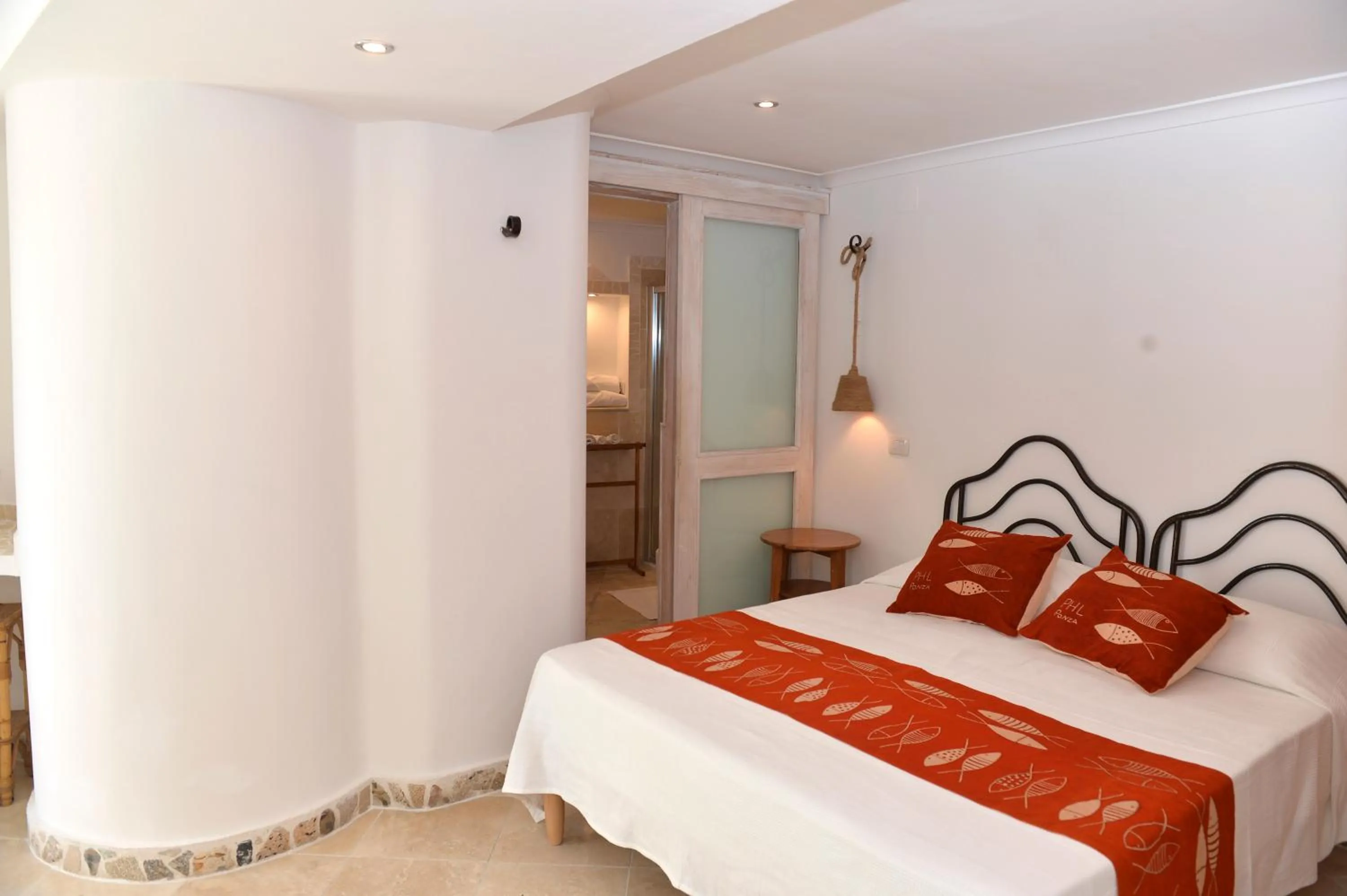 Bed in Piccolo Hotel Luisa