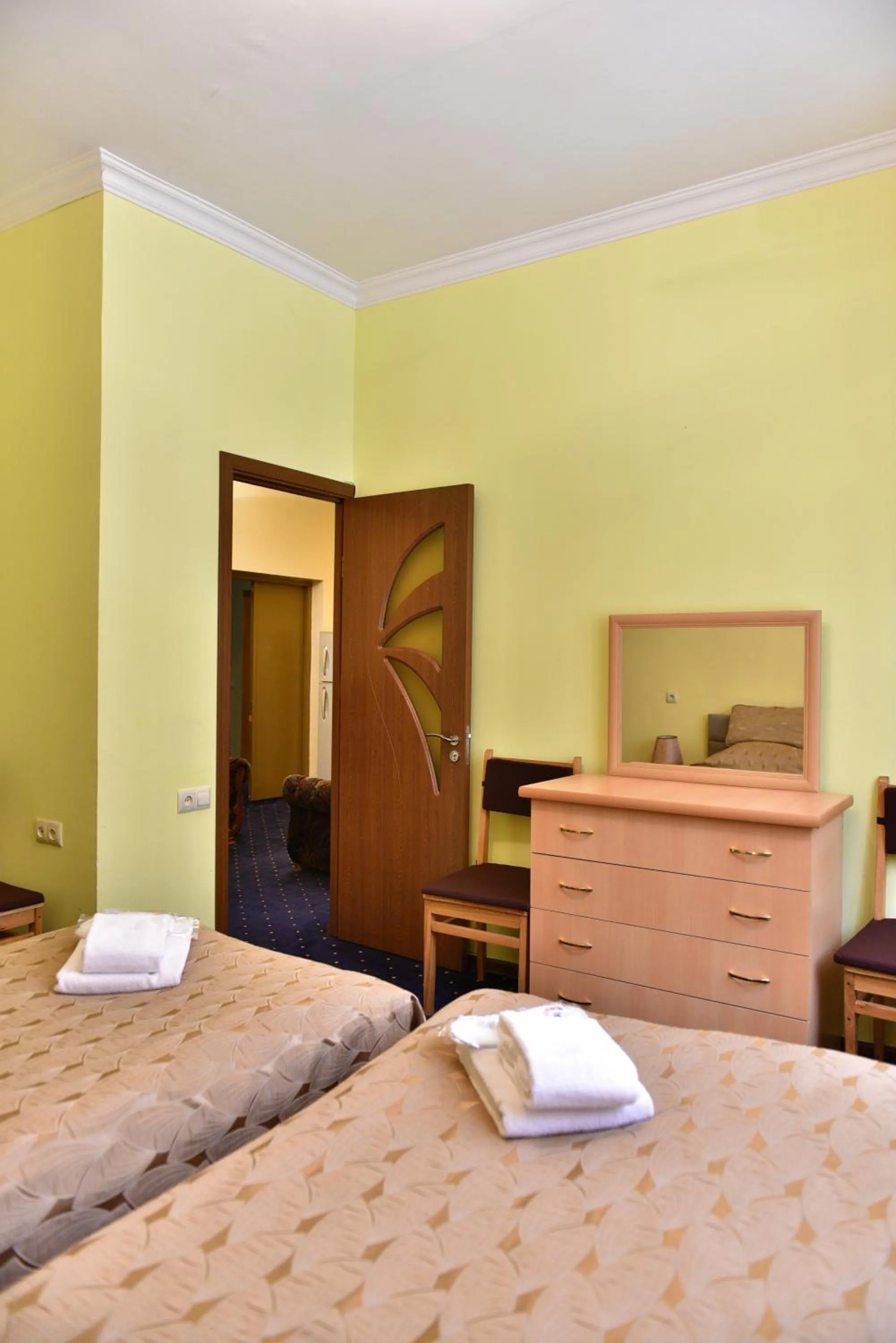 Bedroom in GreenWood Hotel