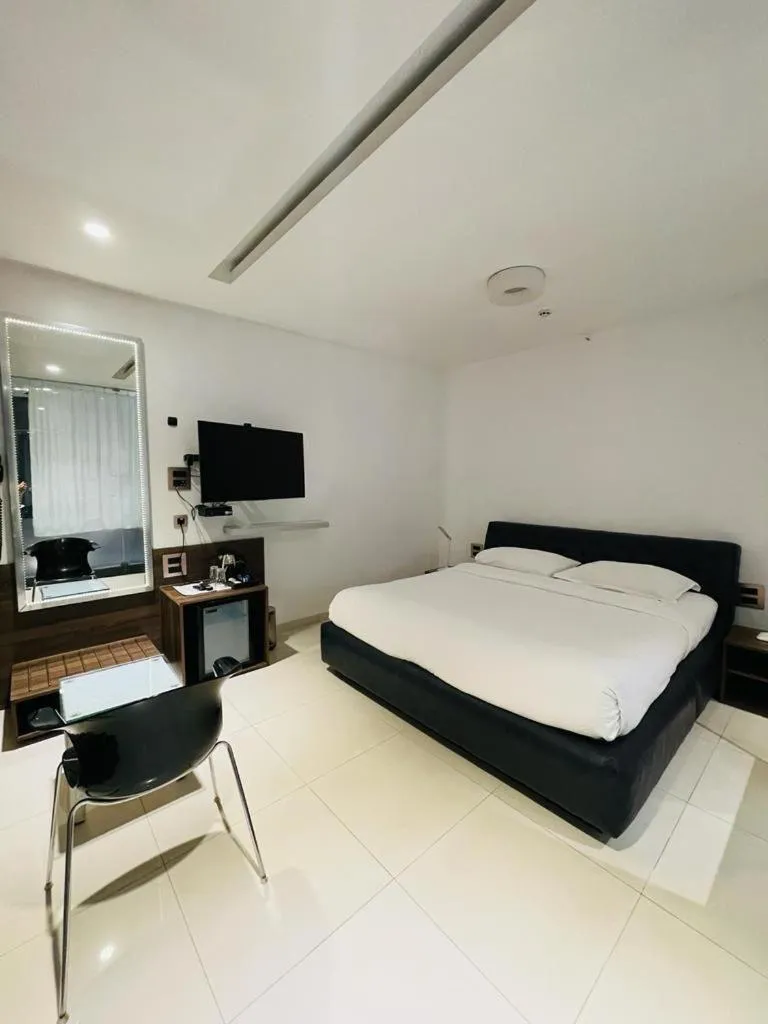 Photo of the whole room, Bed in Fahrenheit Hotels & Resorts