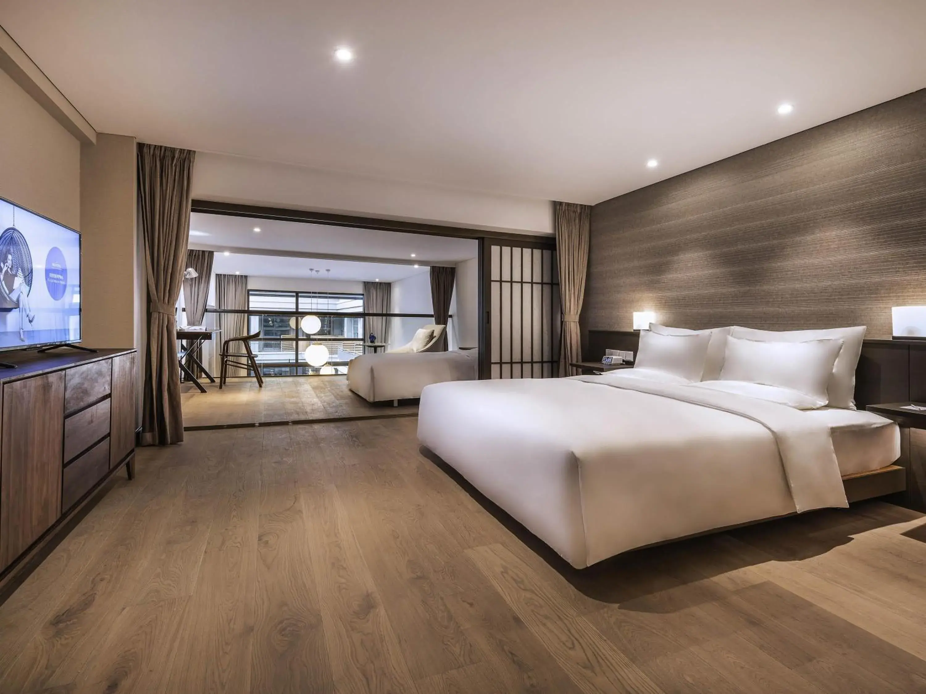 Deluxe Suite with One Double Bed and One Single Bed in Novotel Suites Shanghai Hongqiao Deluxe Suite with One Double Bed and One Single Bed in Novotel Suites Shanghai Hongqiao