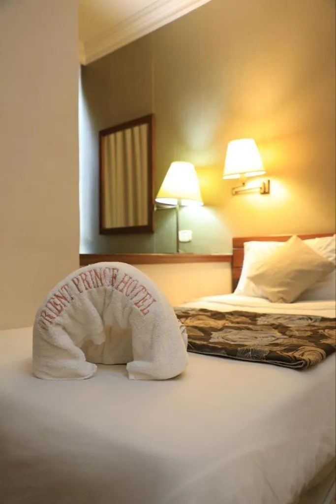 Bed in Orient Prince Hotel