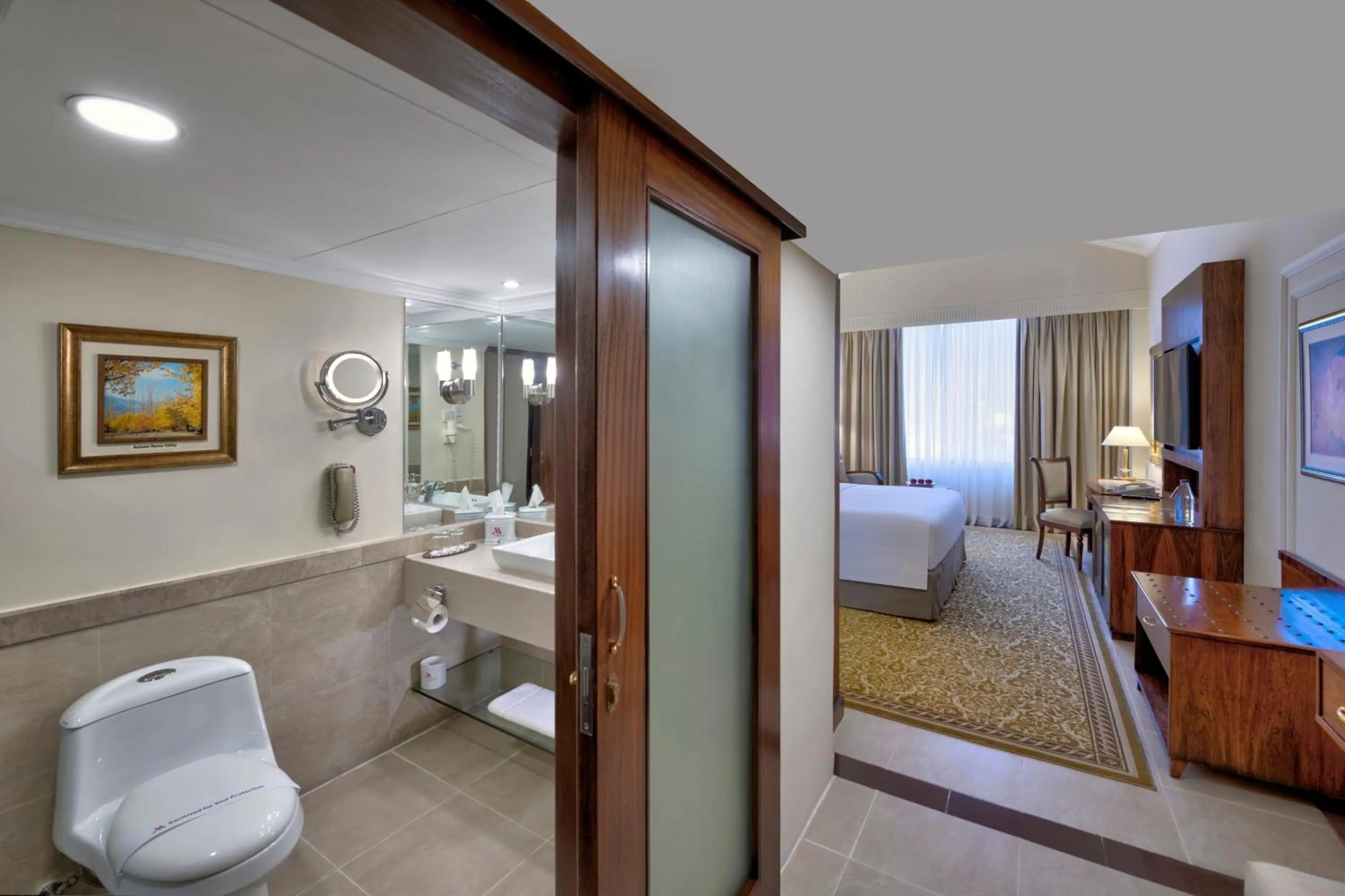 Photo of the whole room, Bed in Islamabad Marriott Hotel