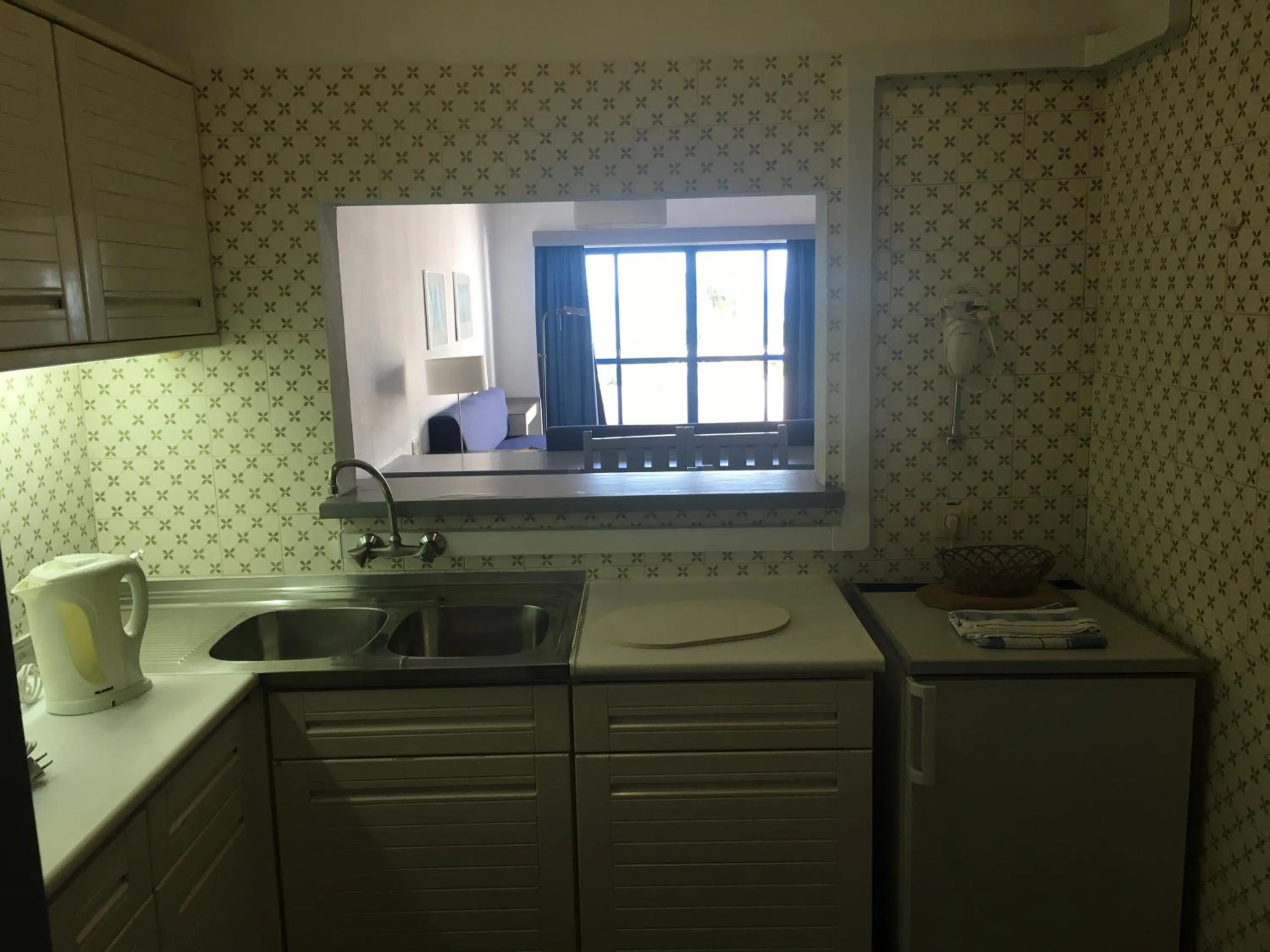 Kitchen or kitchenette in Almar Hotel Apartamento