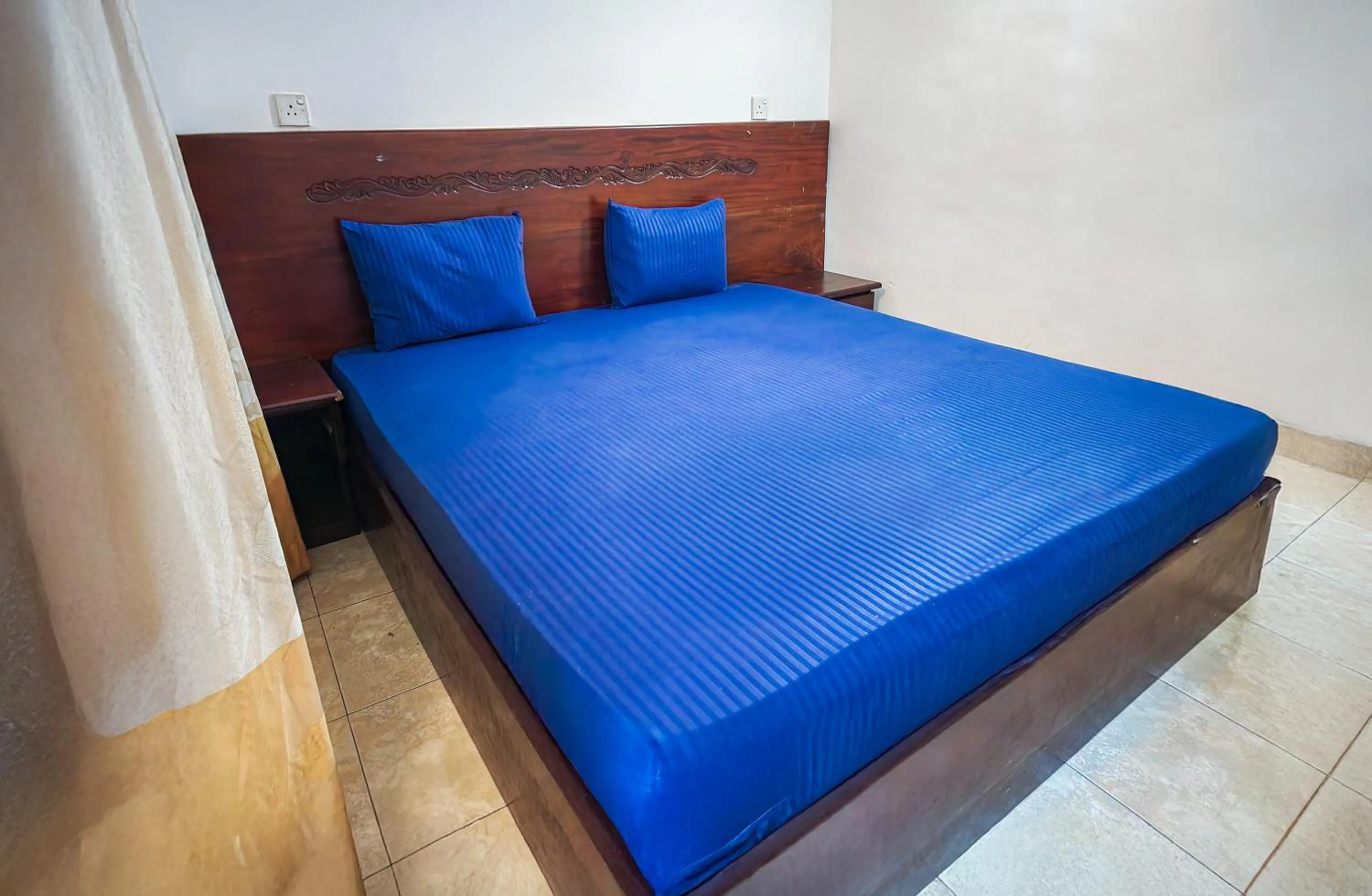 Bed in Airport Green View Resort