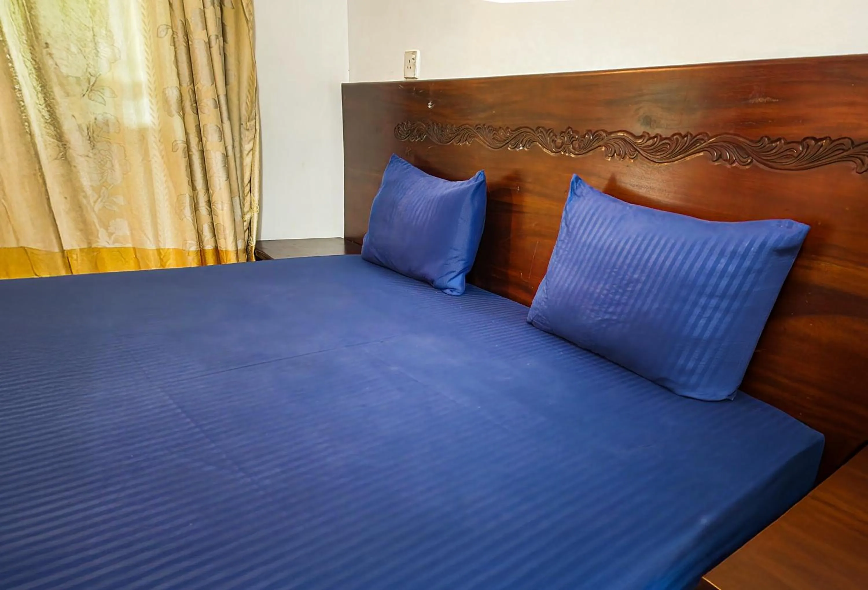 Bed in Airport Green View Resort