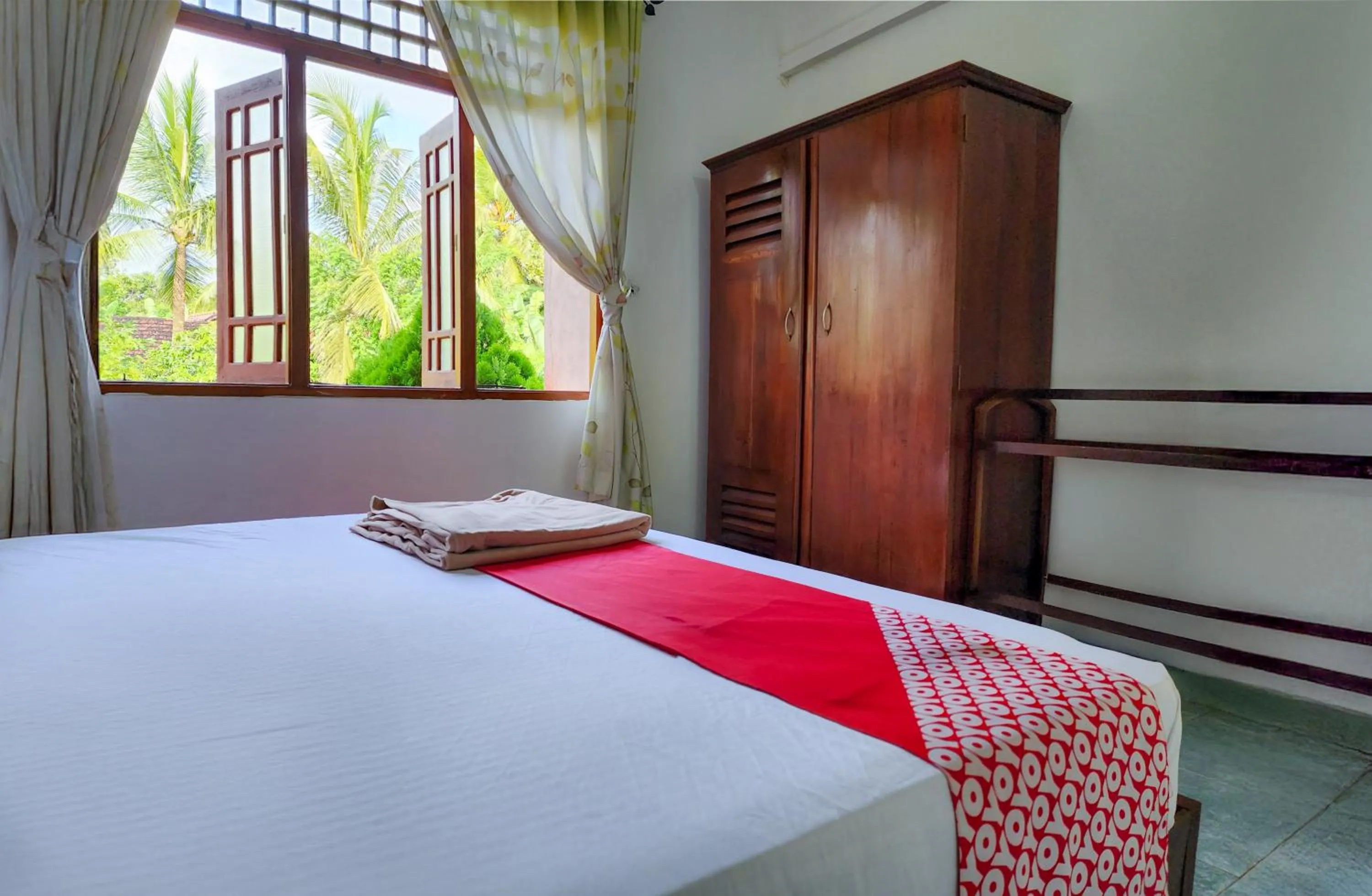 Bed in Airport Green View Resort