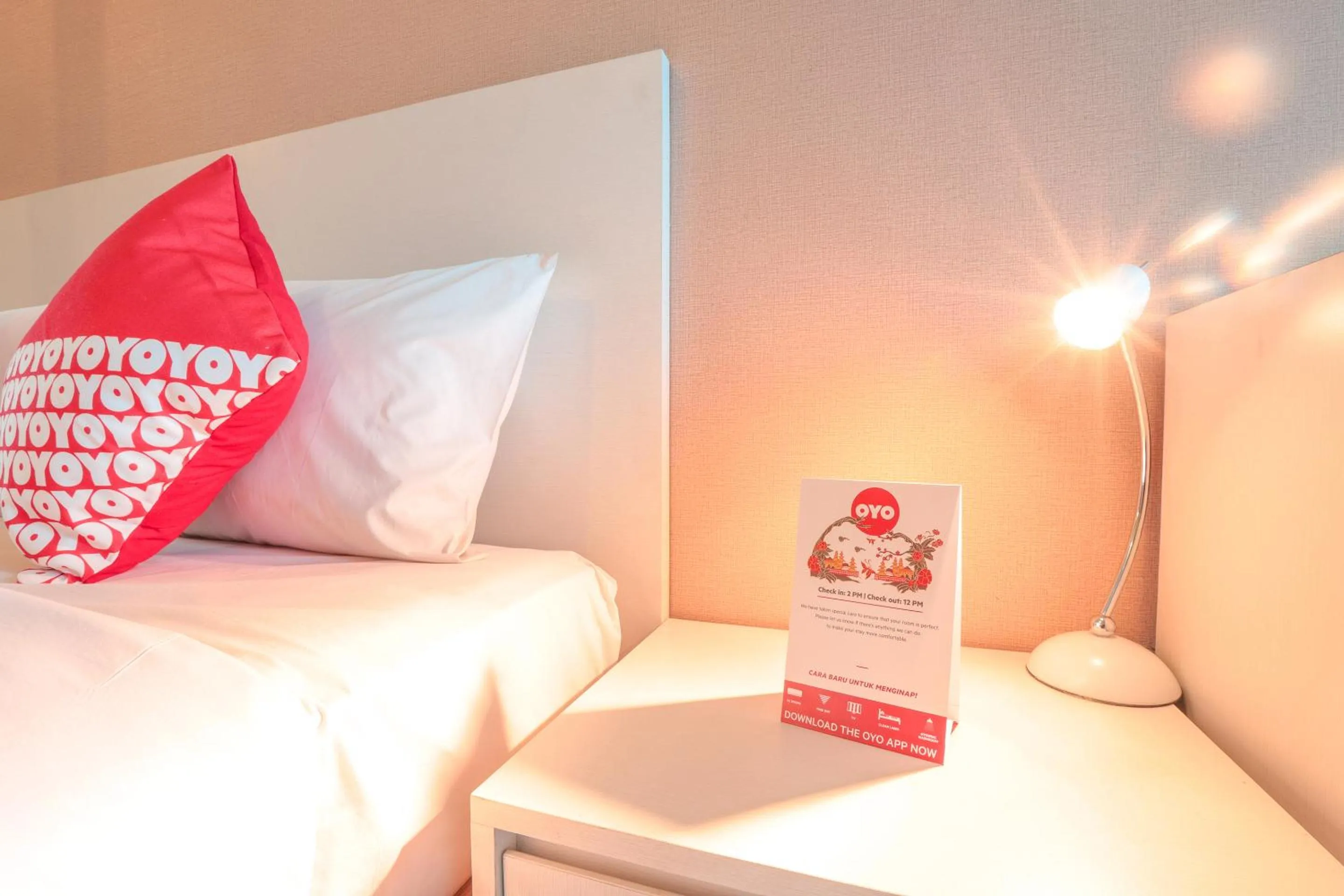 Bedroom in OYO  Flagship 755 Appartel Grand Dhika City