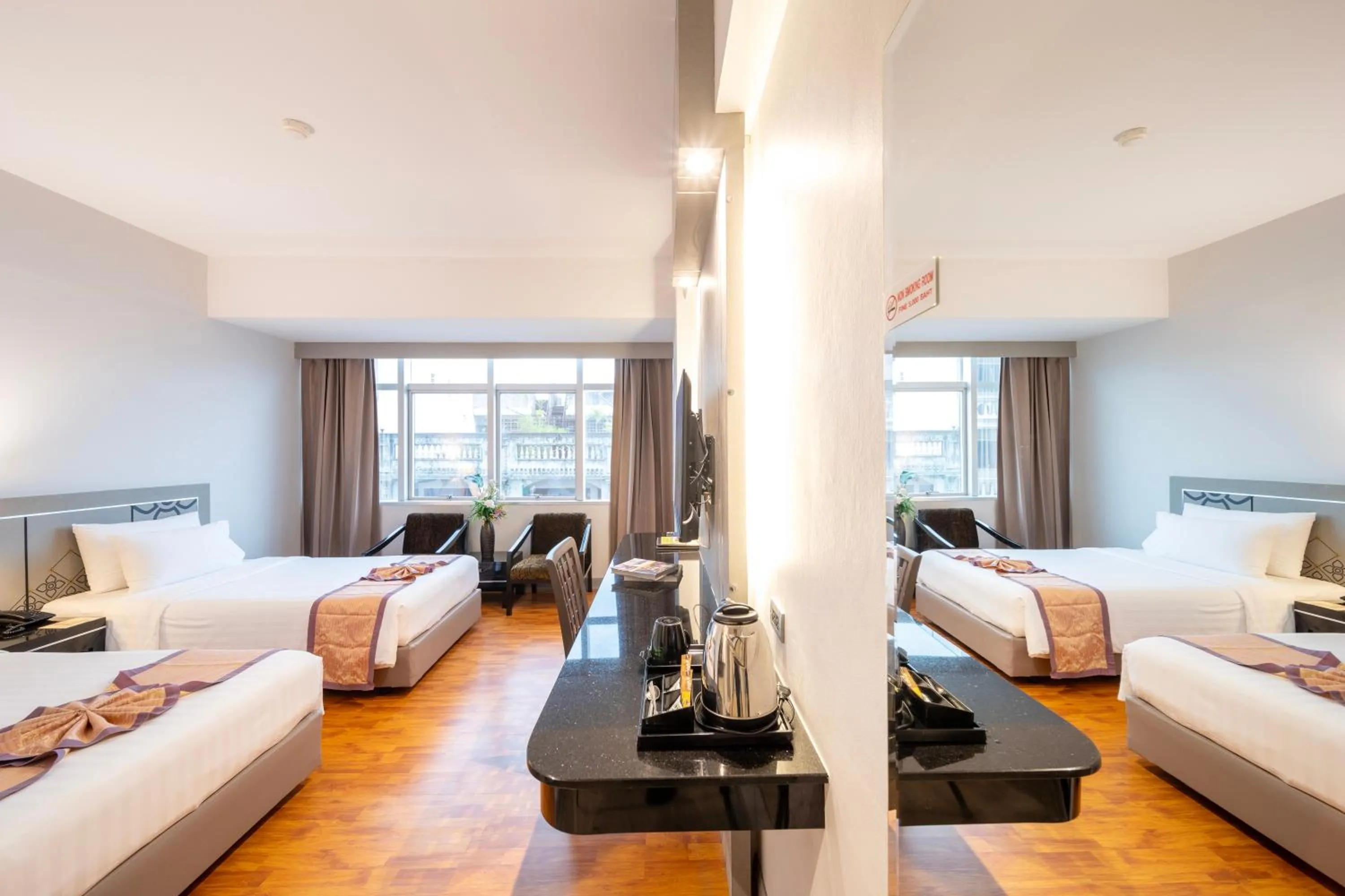 Bed in New Season Hotel