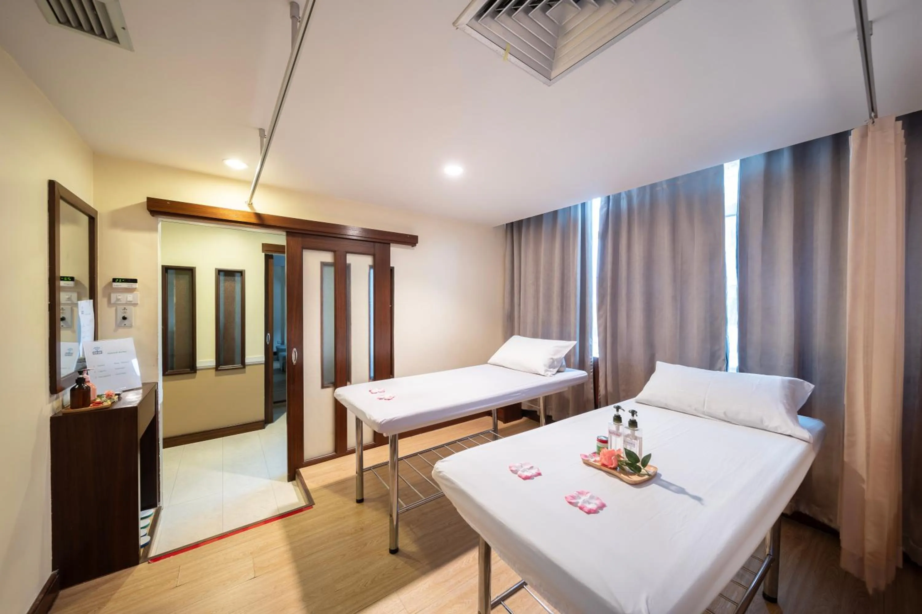 Bed in New Season Hotel