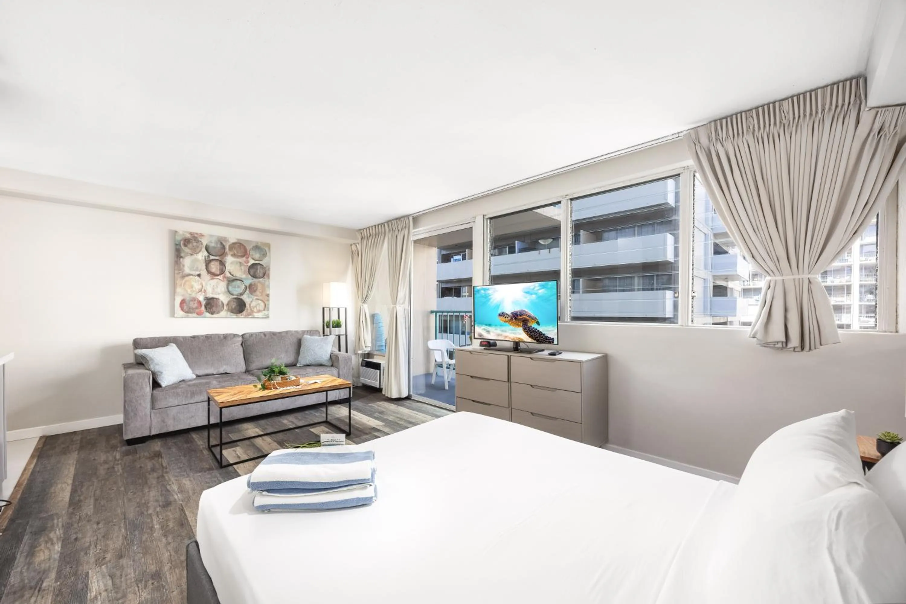 Bed in Renovated Studio with Pool Access at Aloha Surf