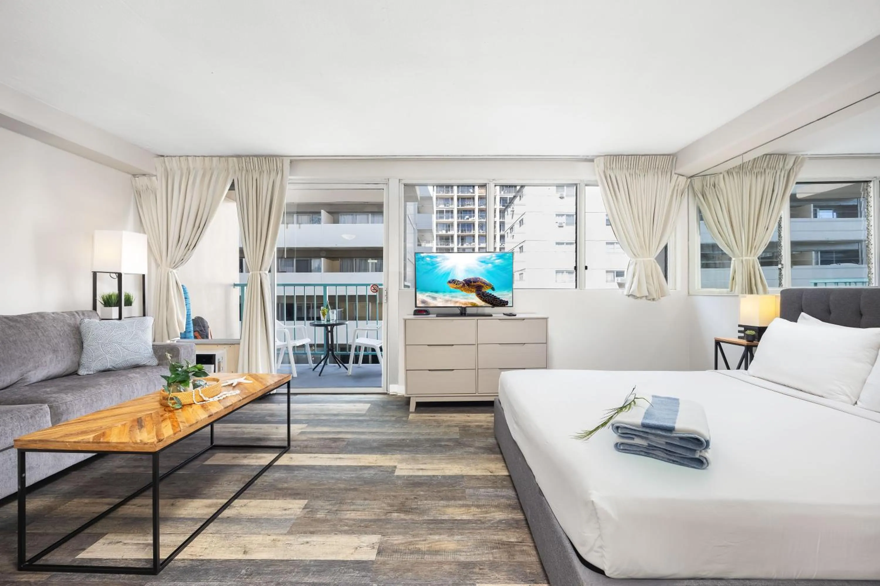 TV and multimedia in Renovated Studio with Pool Access at Aloha Surf