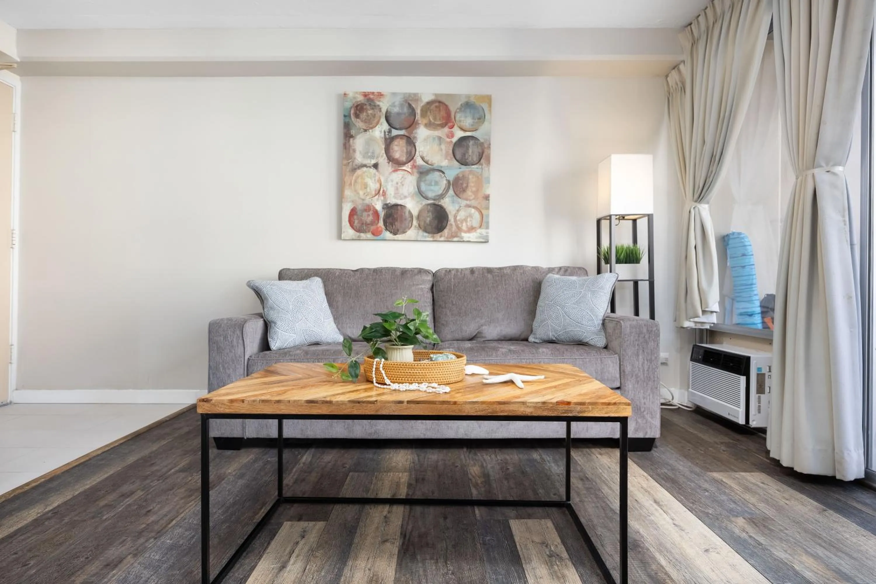 Living room in Renovated Studio with Pool Access at Aloha Surf