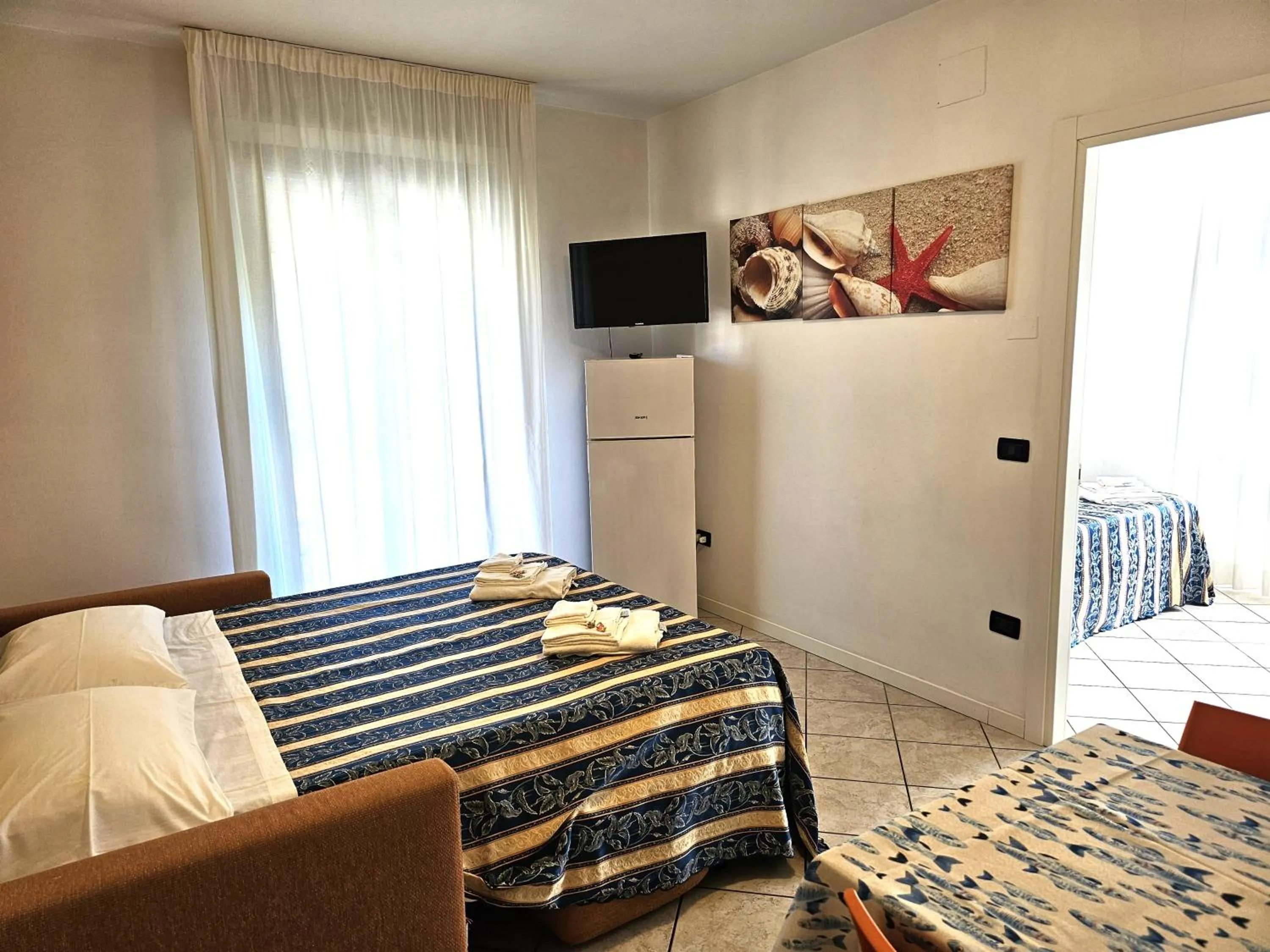 Living room, Bed in Residence Millennium