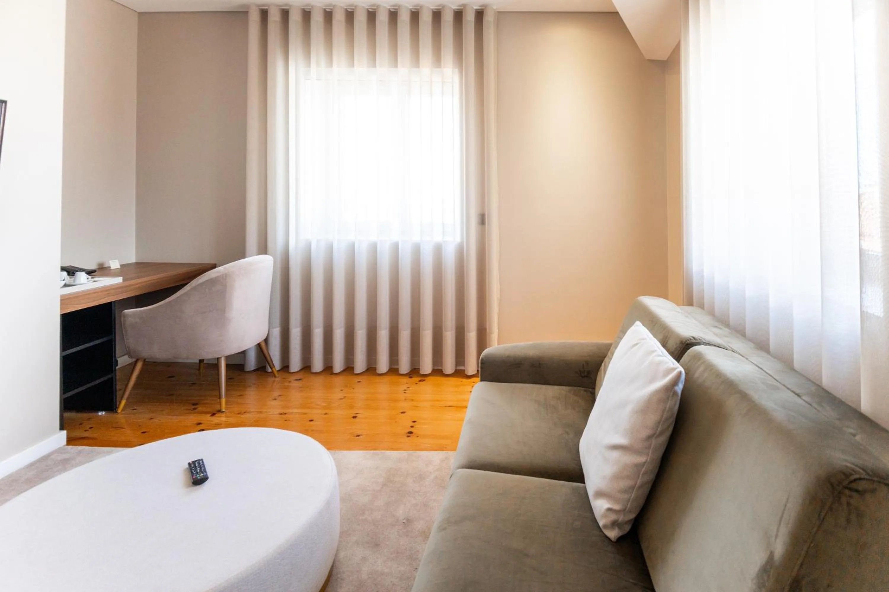 Seating area in Avenida Boutique Hotel