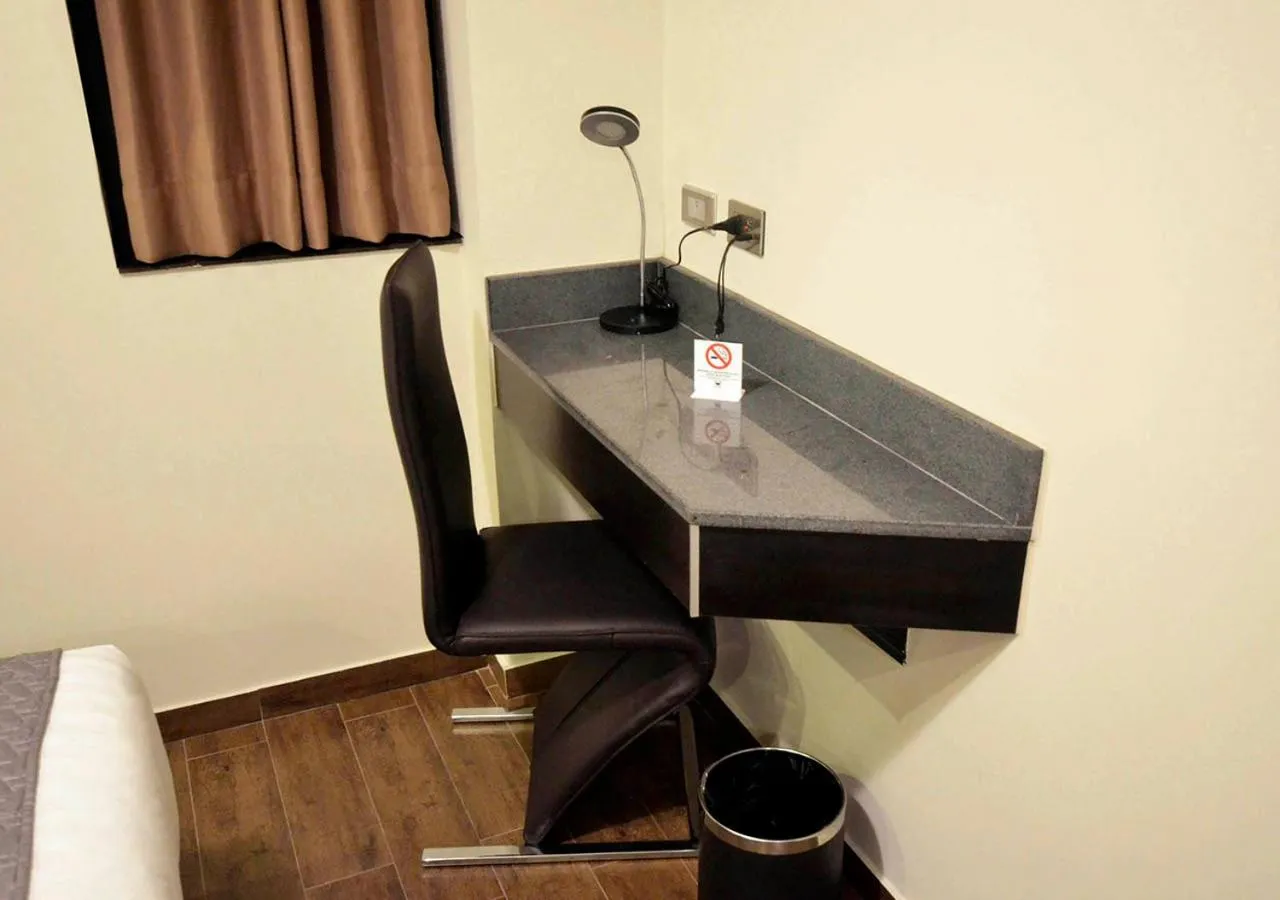 Photo of the whole room in qp Hotels Trujillo